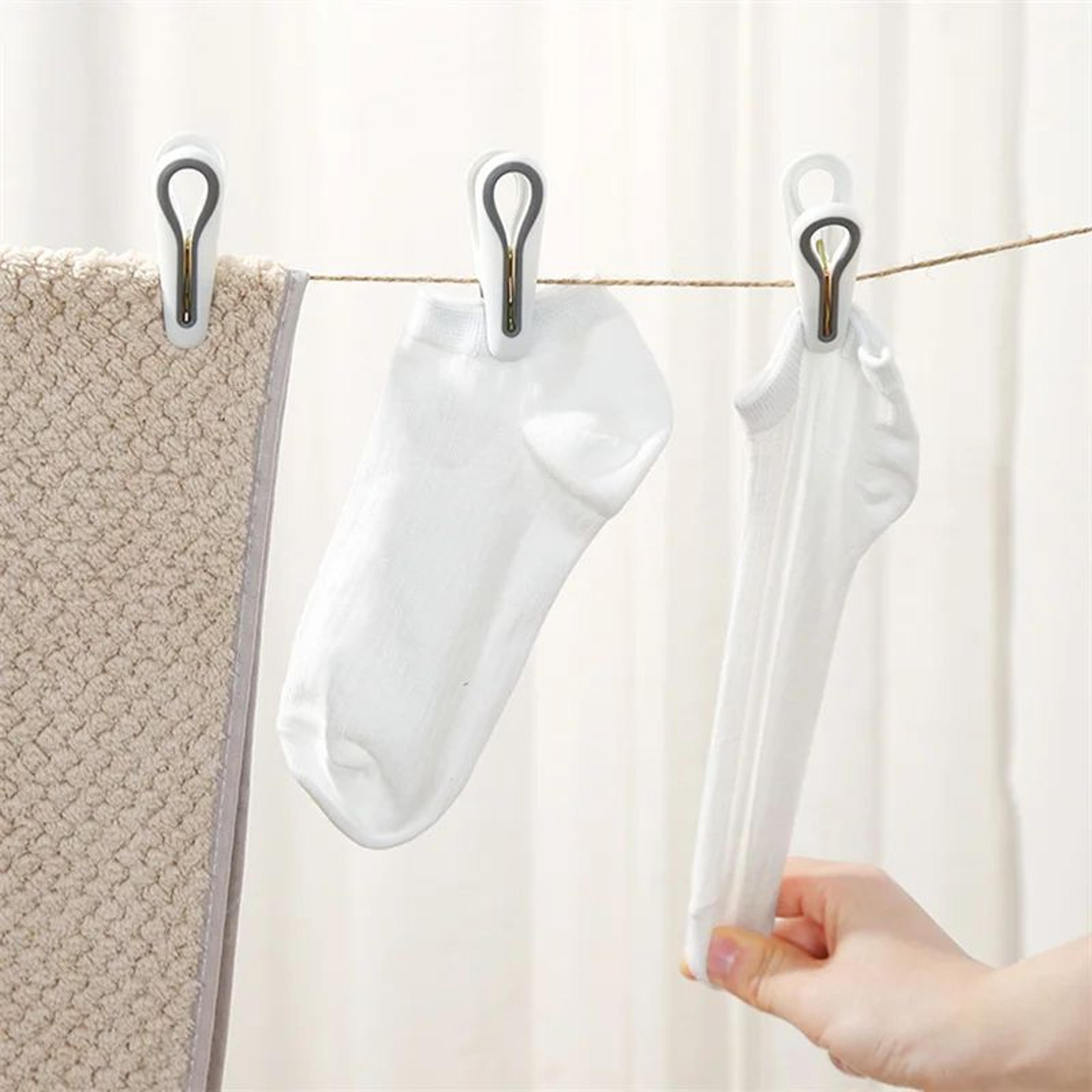 multi-functional laundry peg organizer basket with durable plastic clips – space-saving clothes pins storage & hanging r