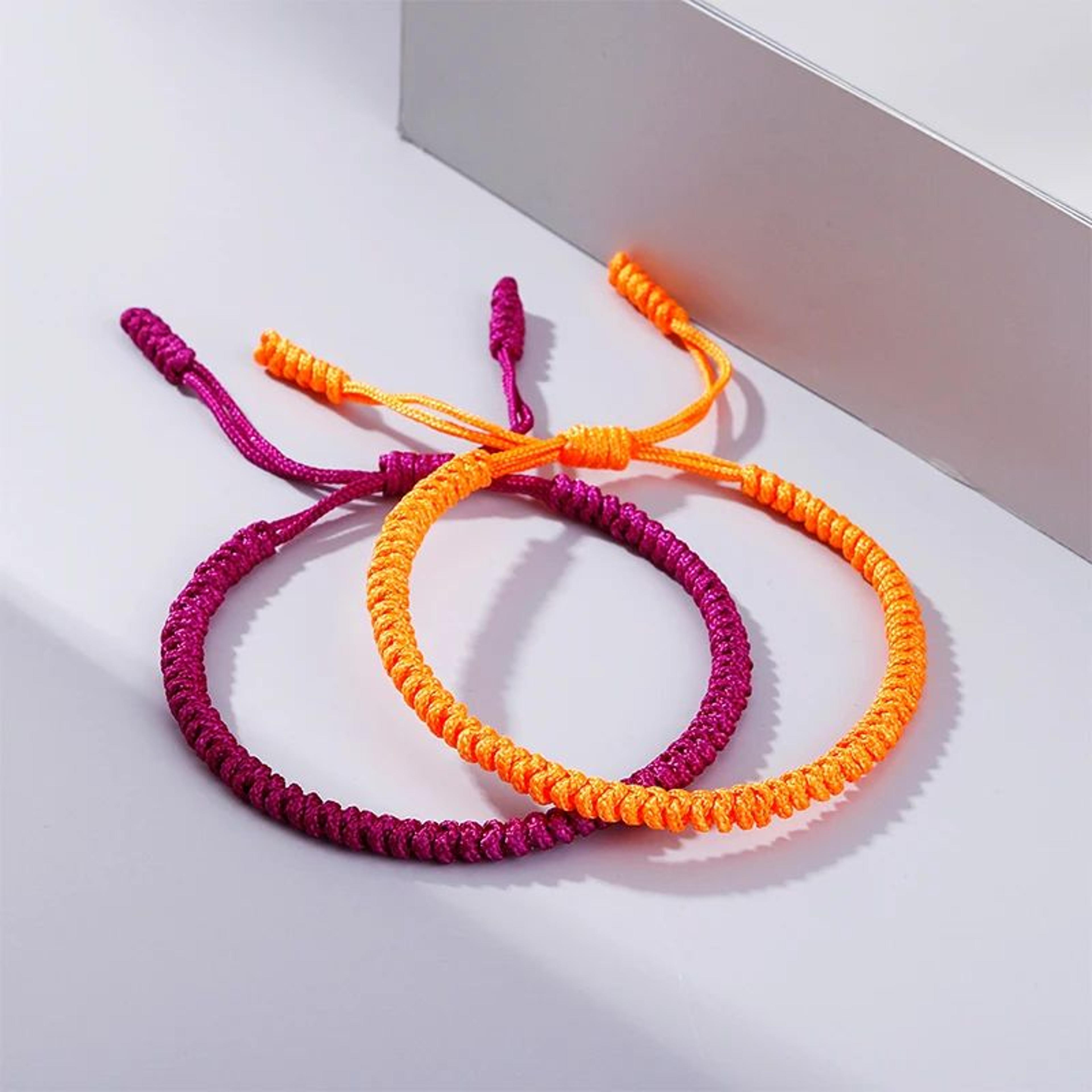 handmade orange braided knot bracelet – adjustable tibetan buddhist rope charm bracelet for women & men