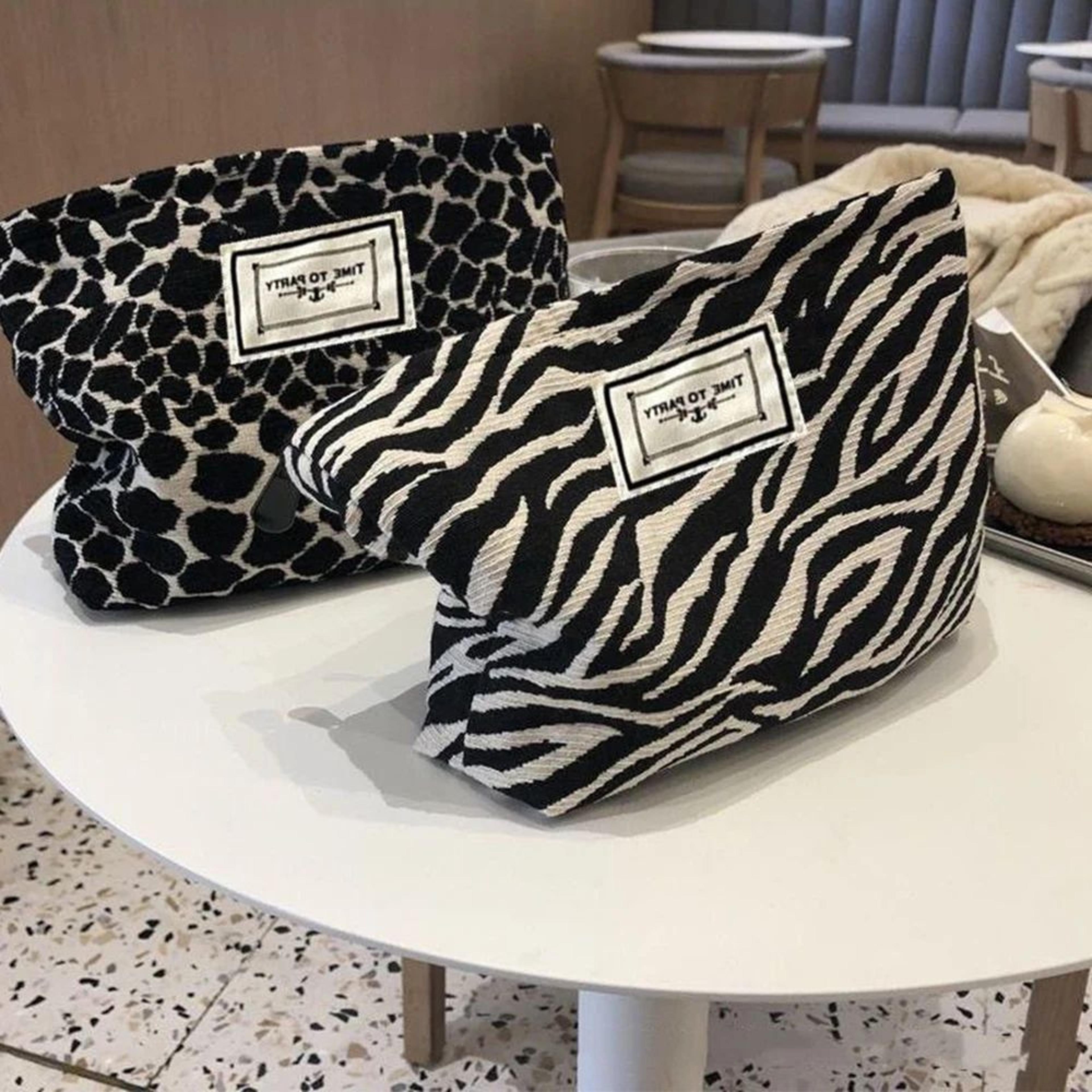 leopard and zebra print makeup bag