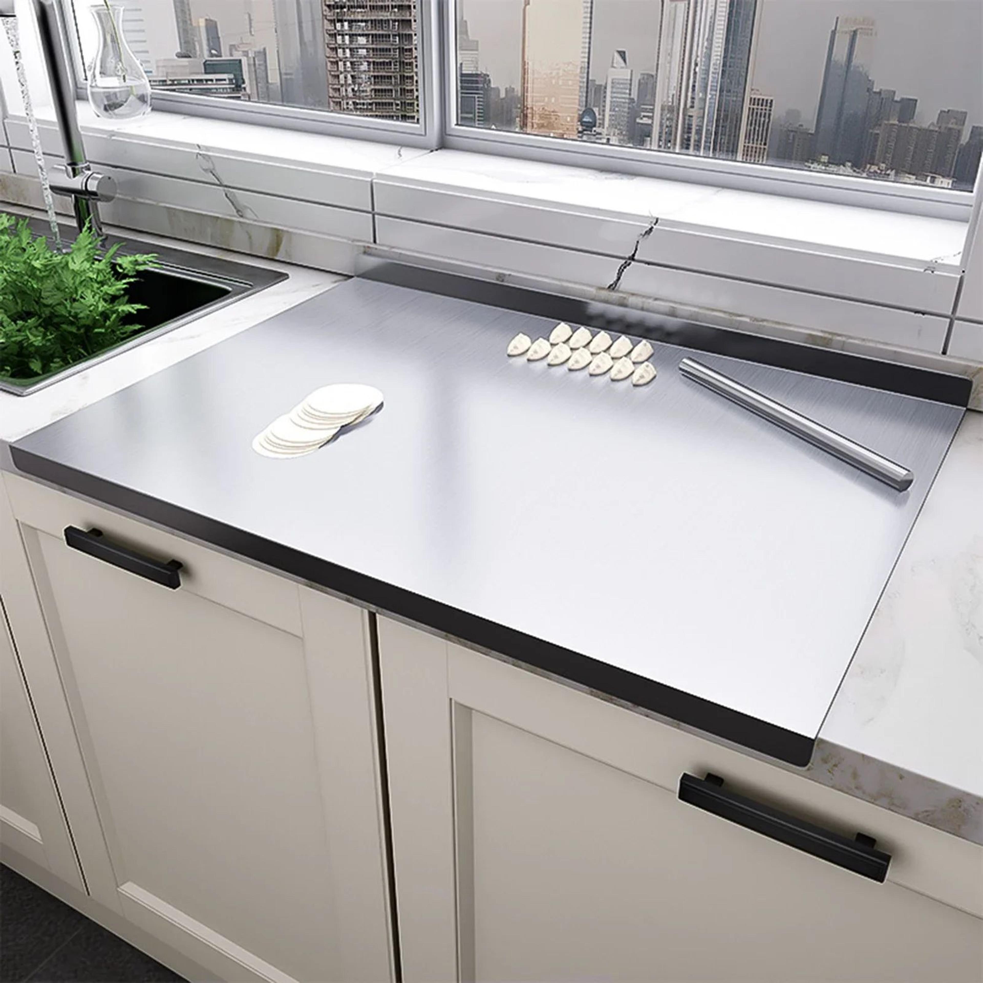 stainless steel cutting board with protector lip