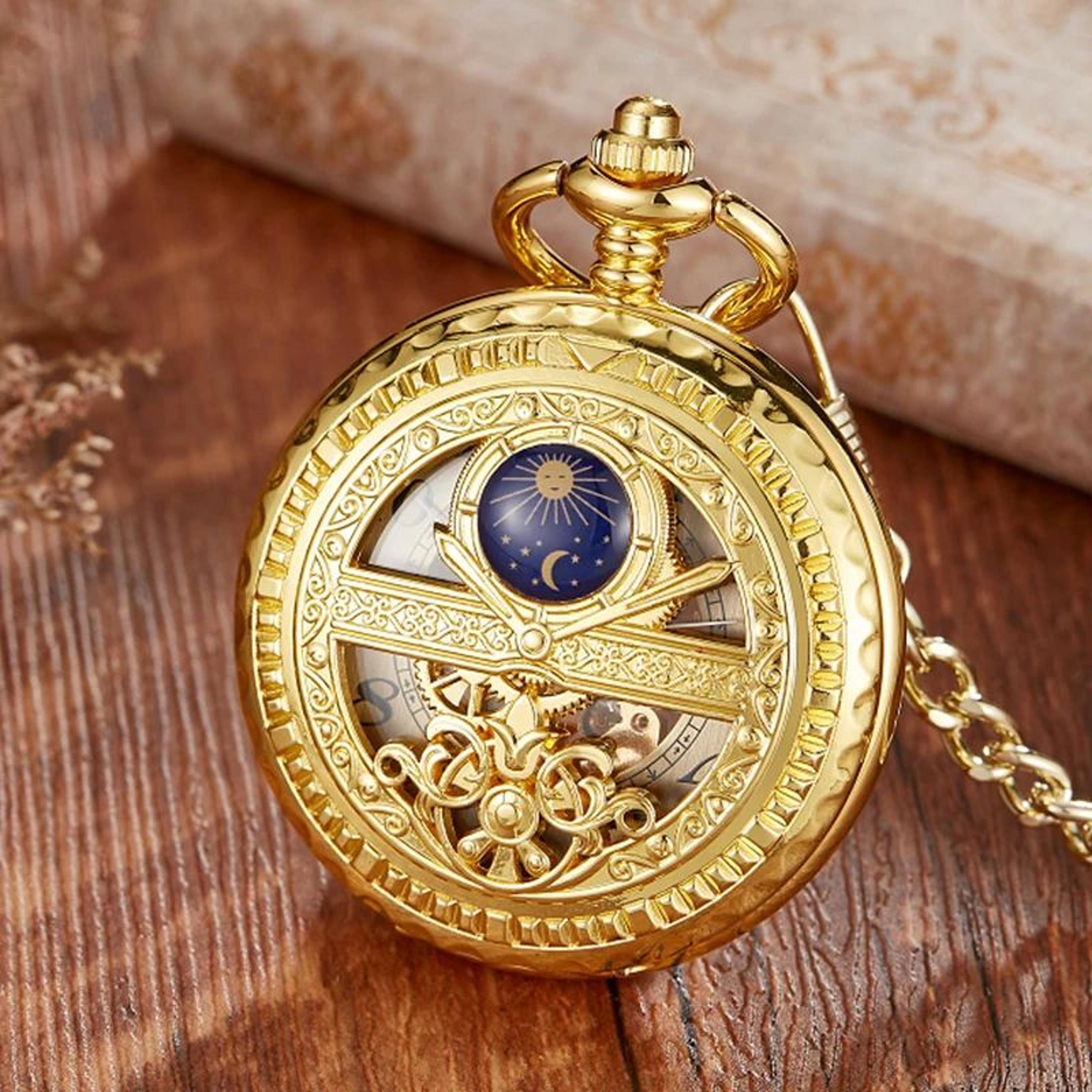 mechanical pocket watch star and moon phase skeleton design