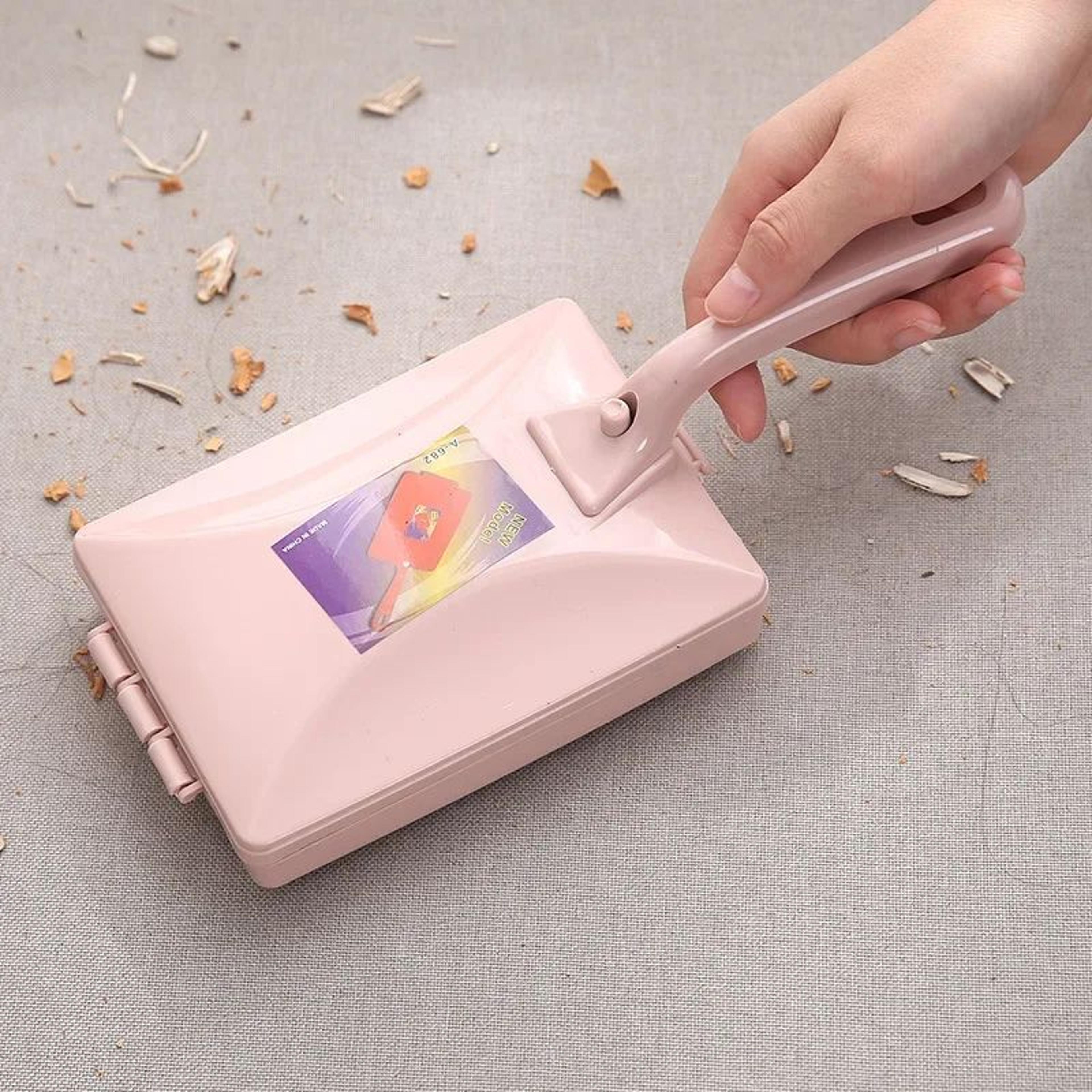 handheld carpet and pet hair cleaning brush