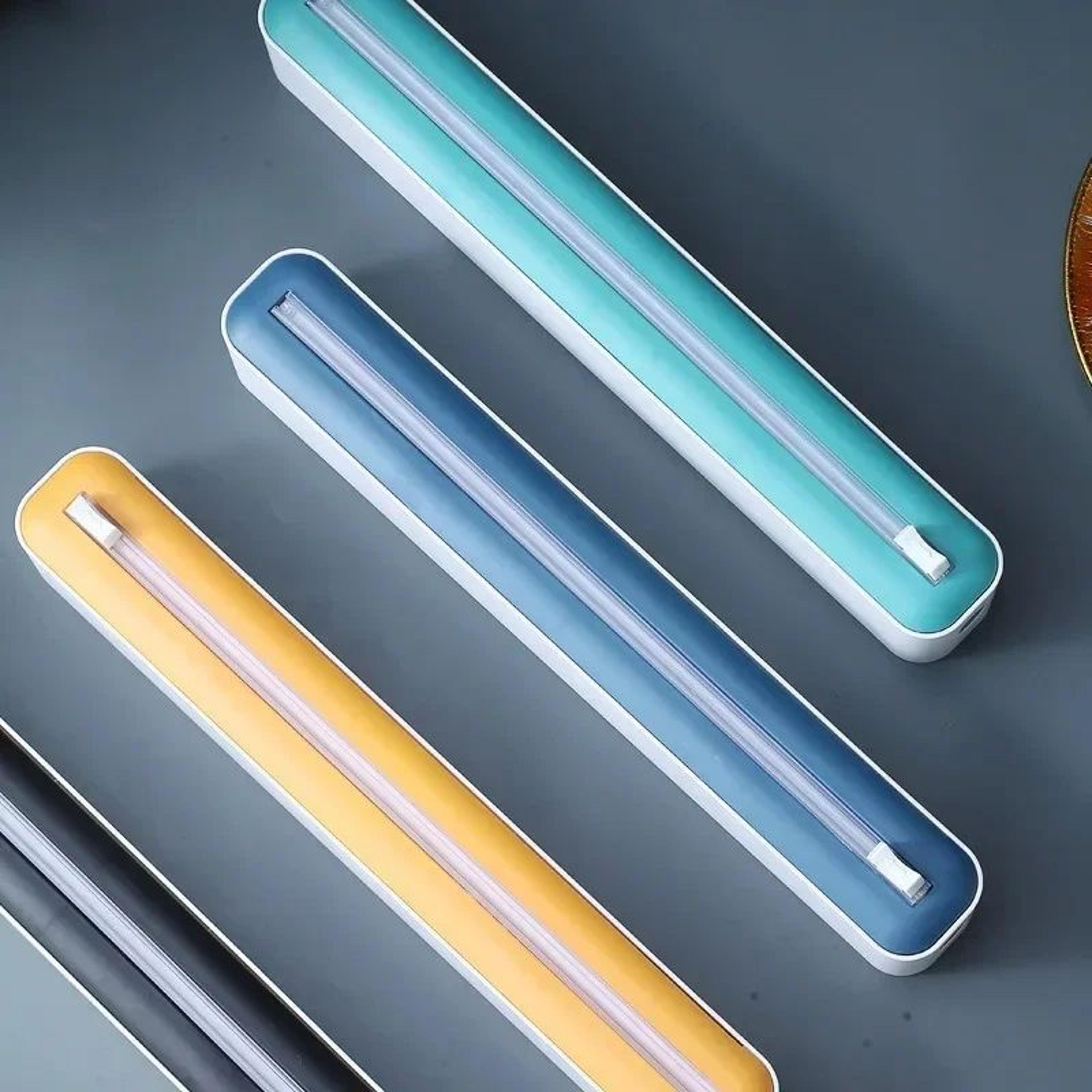 kitchen cling film cutter and food wrap dispenser