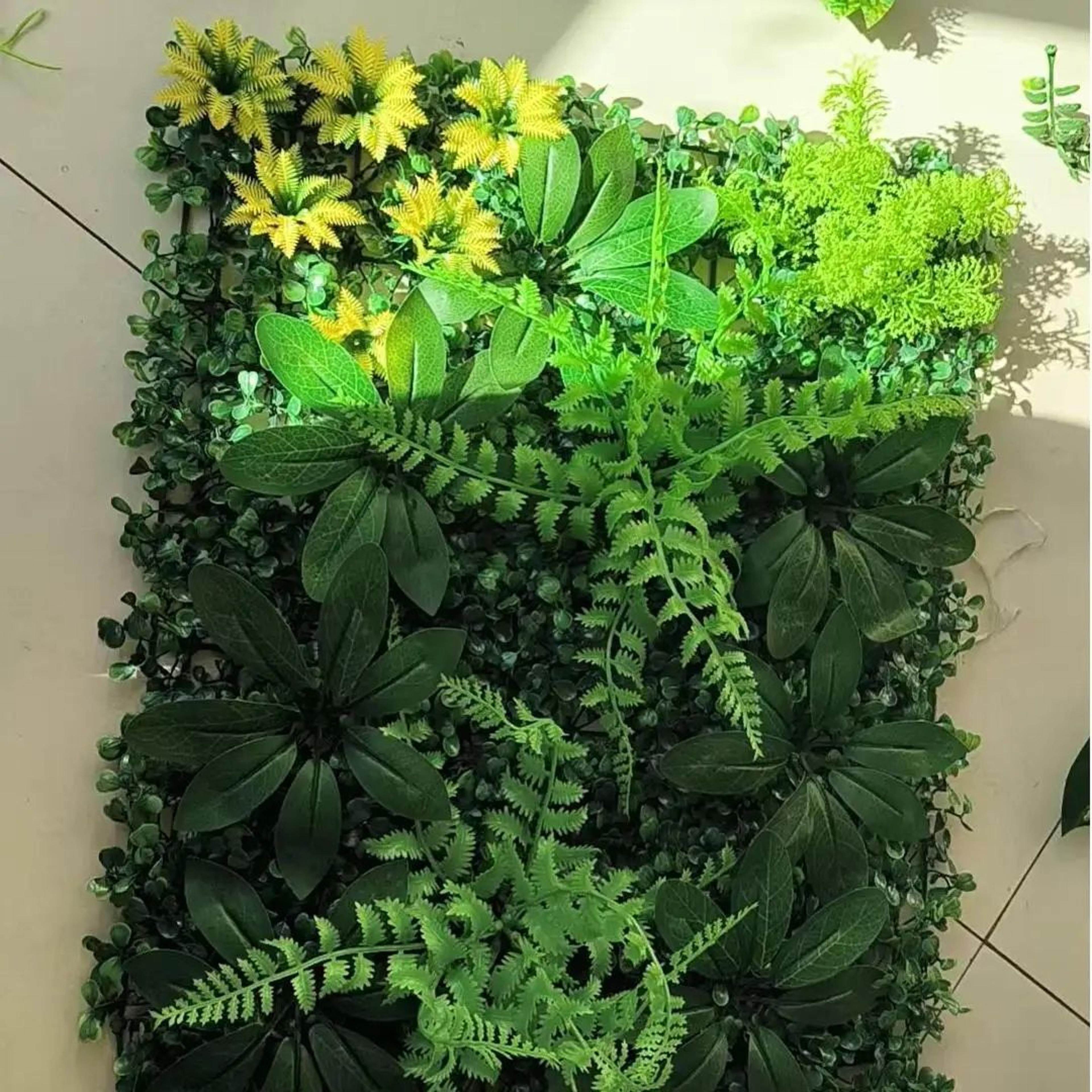 artificial green plant wall panel with boxwood and faux flowers