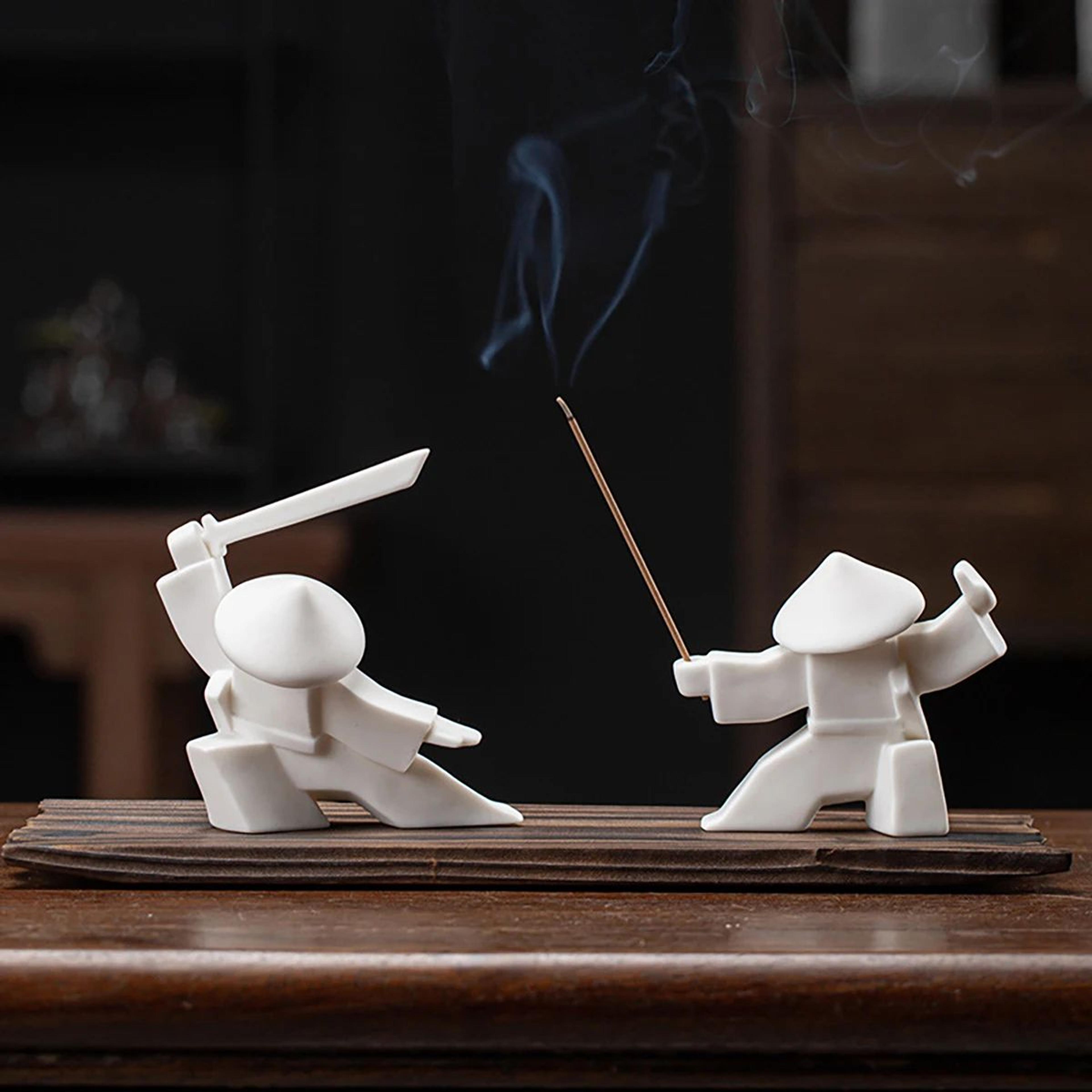 white ceramic samurai figurine oriental warrior statue