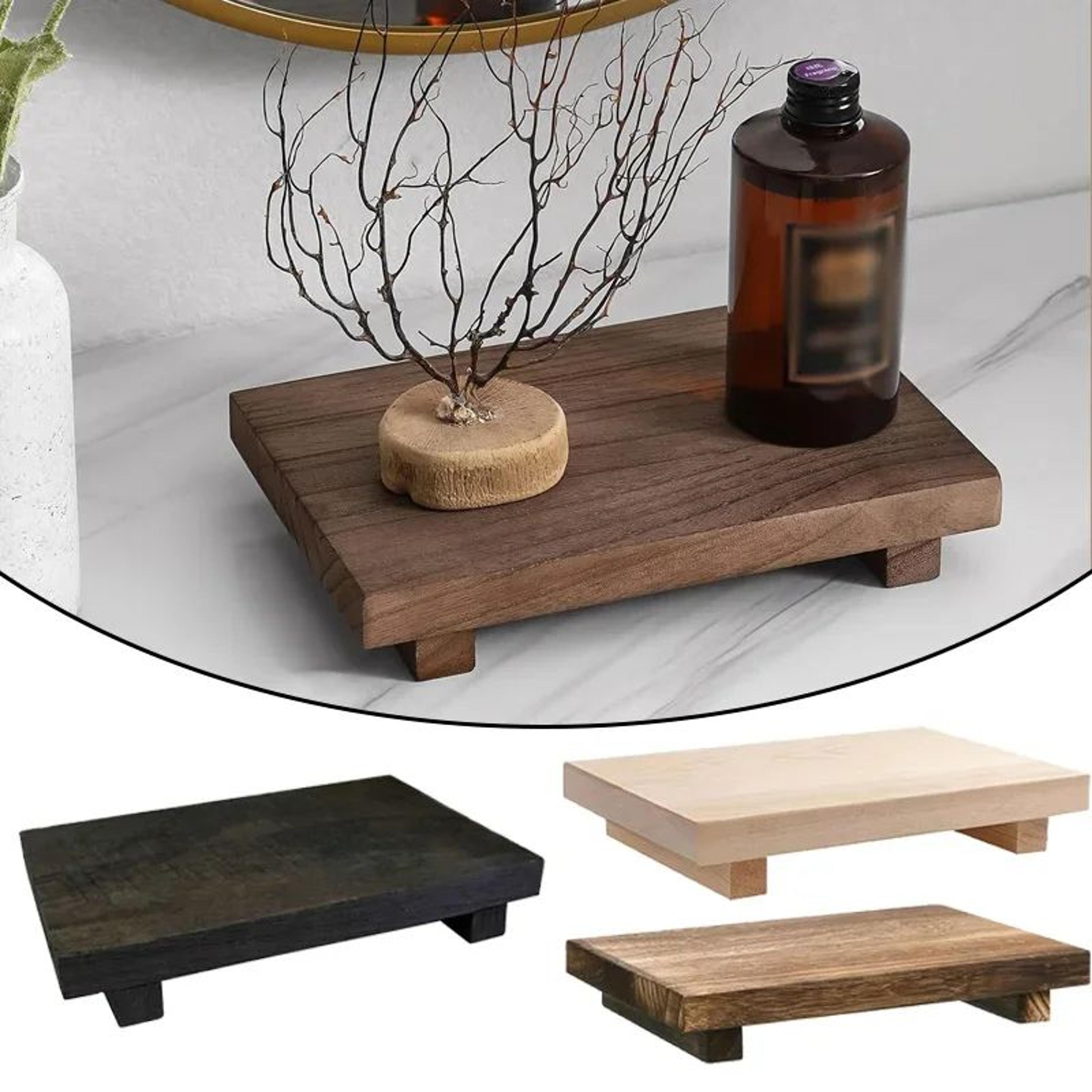wooden pedestal vanity and countertop tray