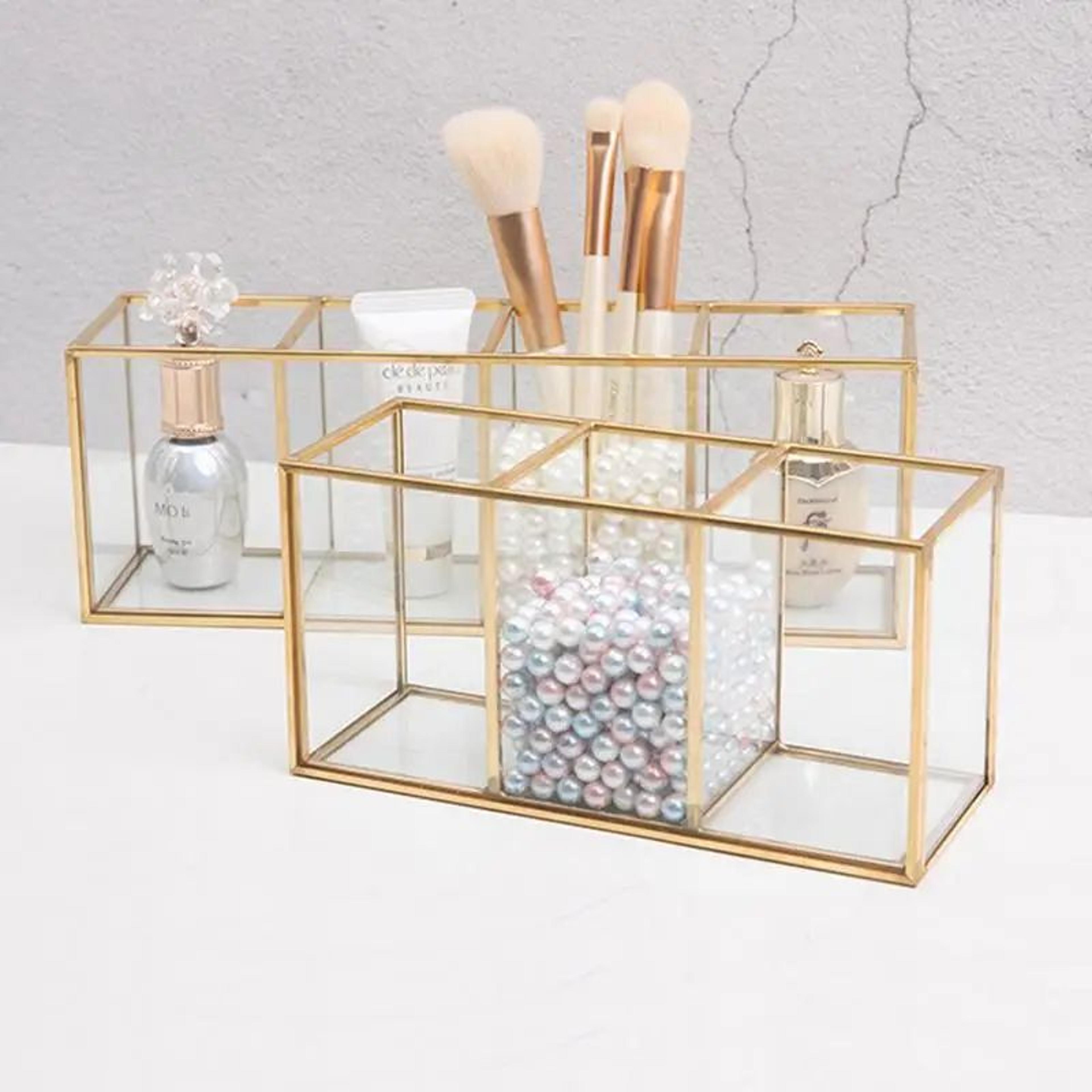 transparent glass makeup brush organizer with gold trim