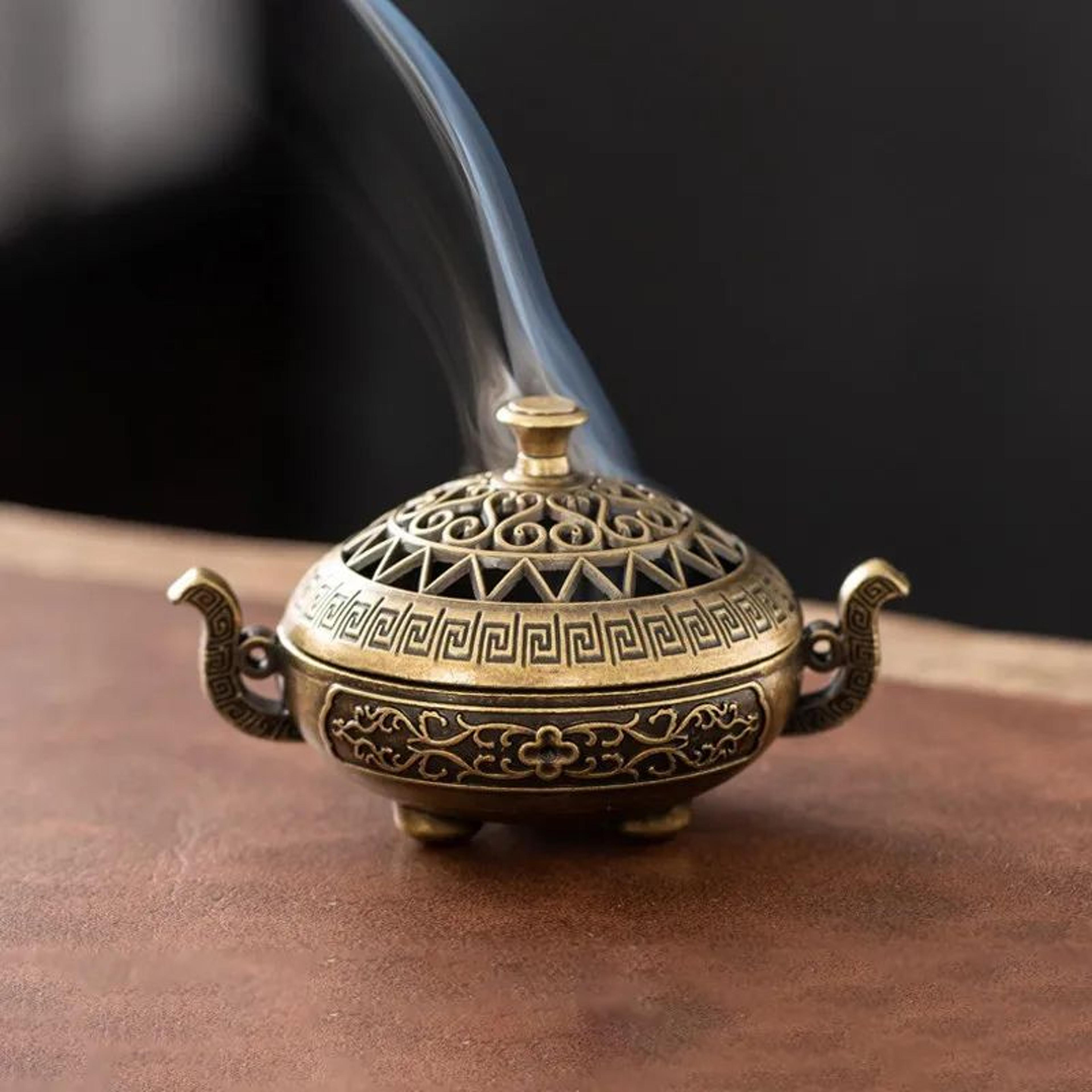 vintage three legged alloy incense burner and stick holder