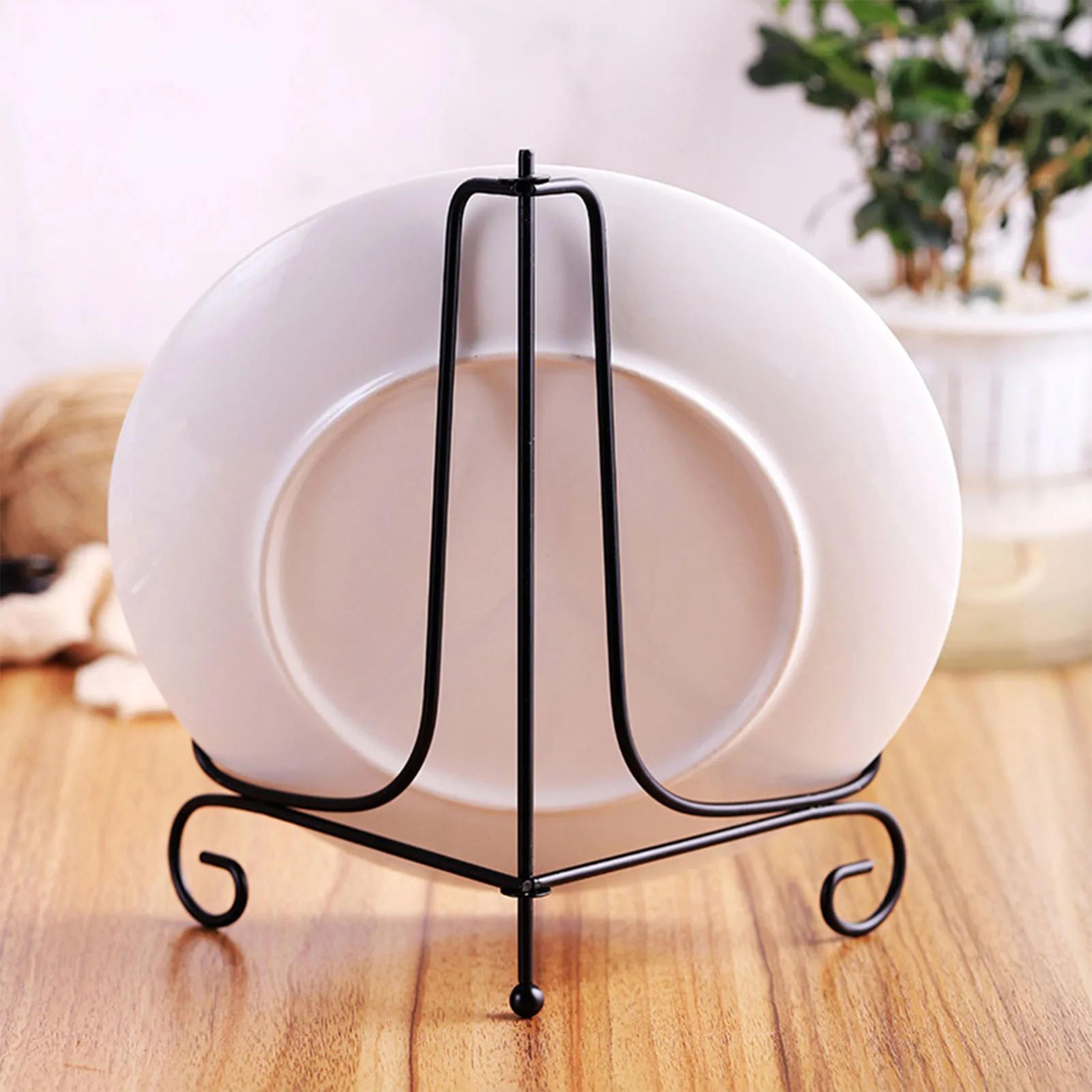 black iron tea cake and decorative plate display stand