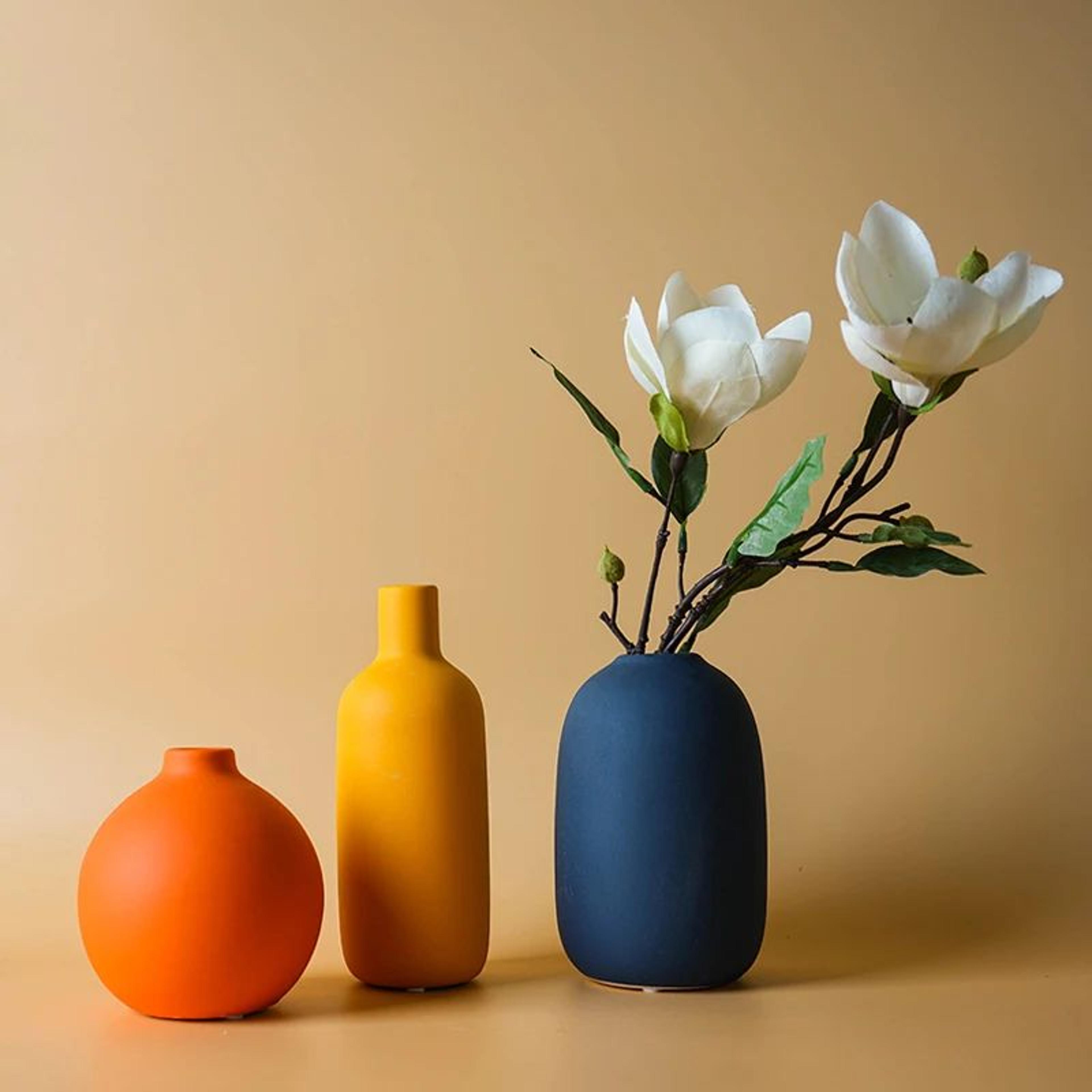 nordic ceramic vase with small bottleneck