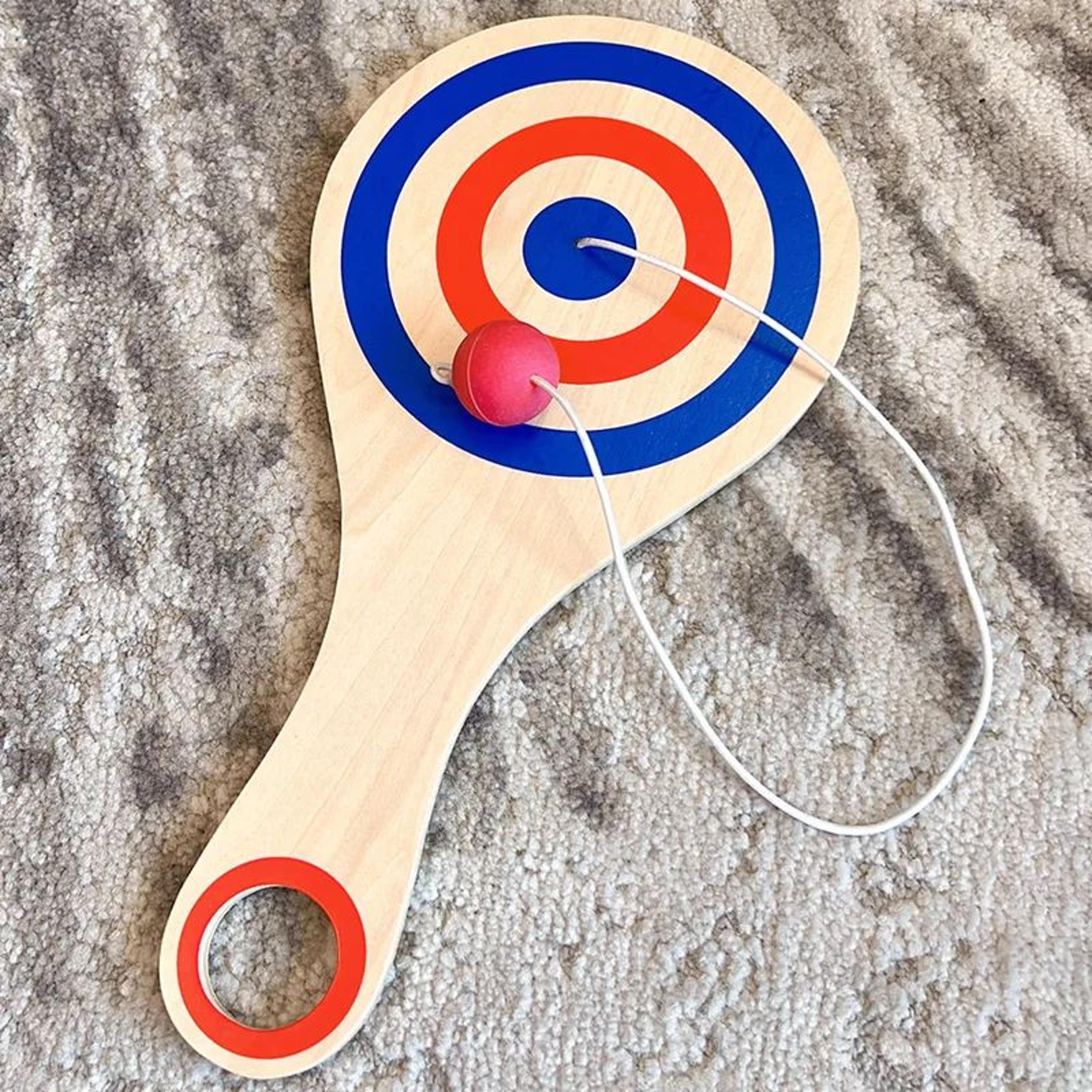 wooden paddle ball toy with string