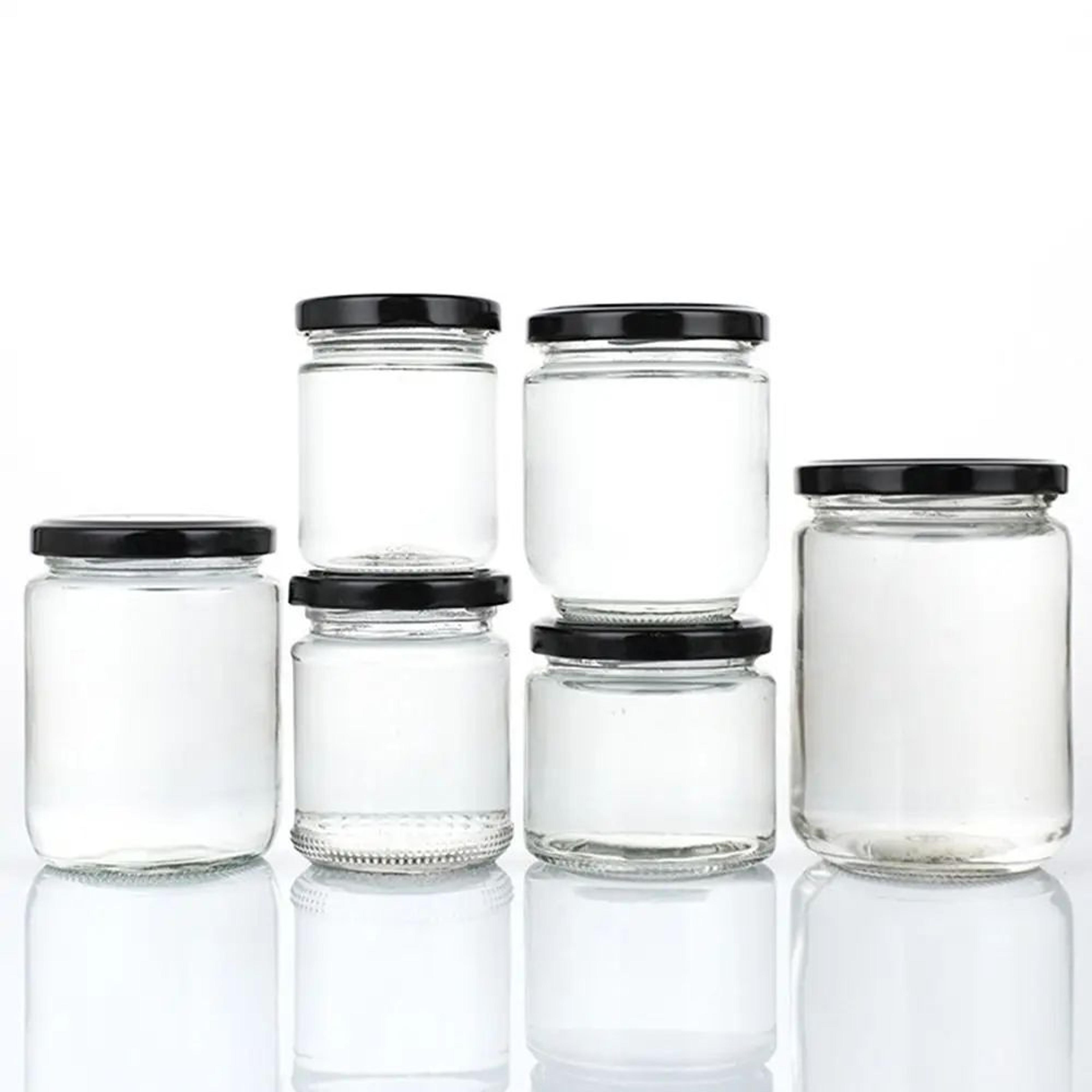 round glass food storage jar with black airtight lid