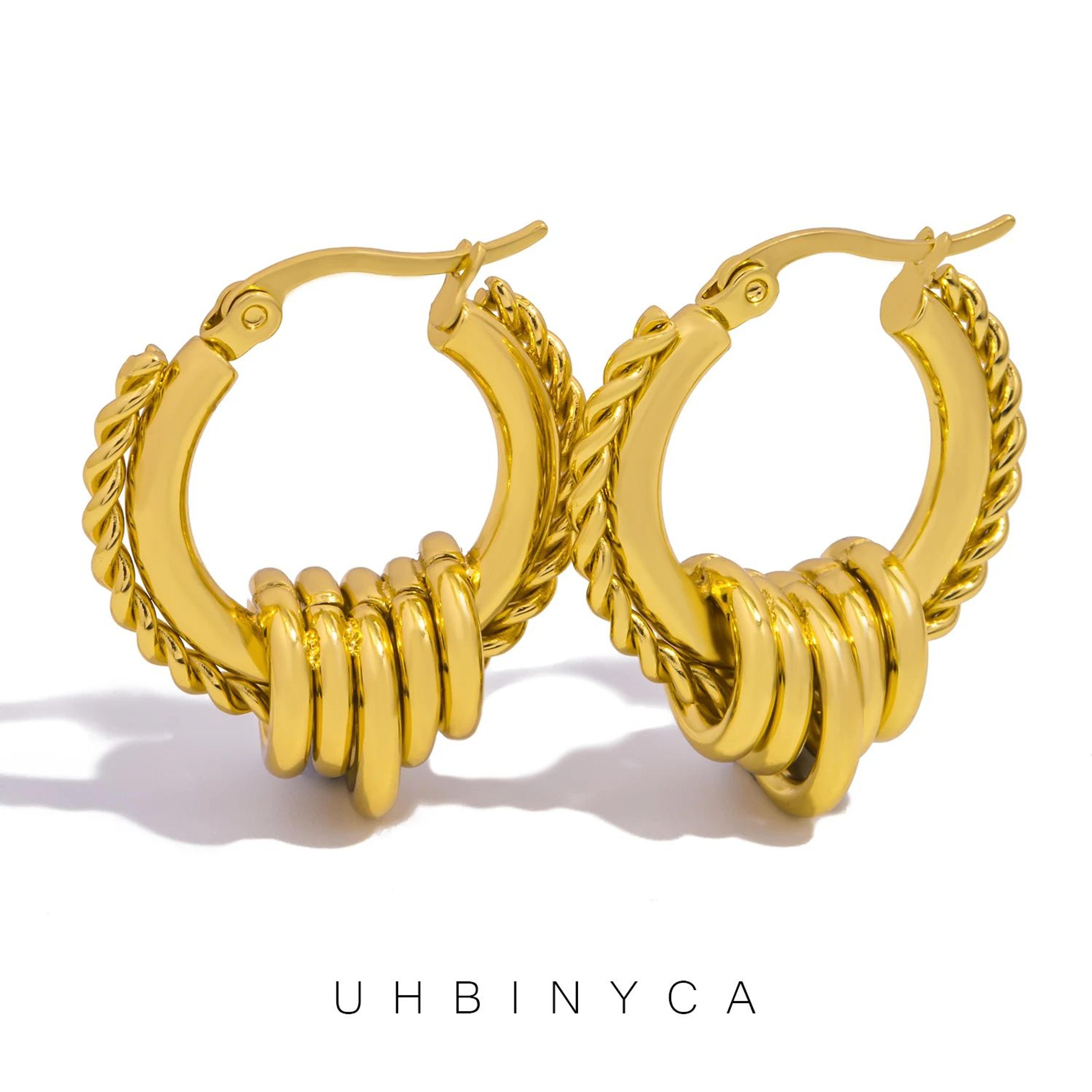 gold textured multilayer twisted circle statement earrings