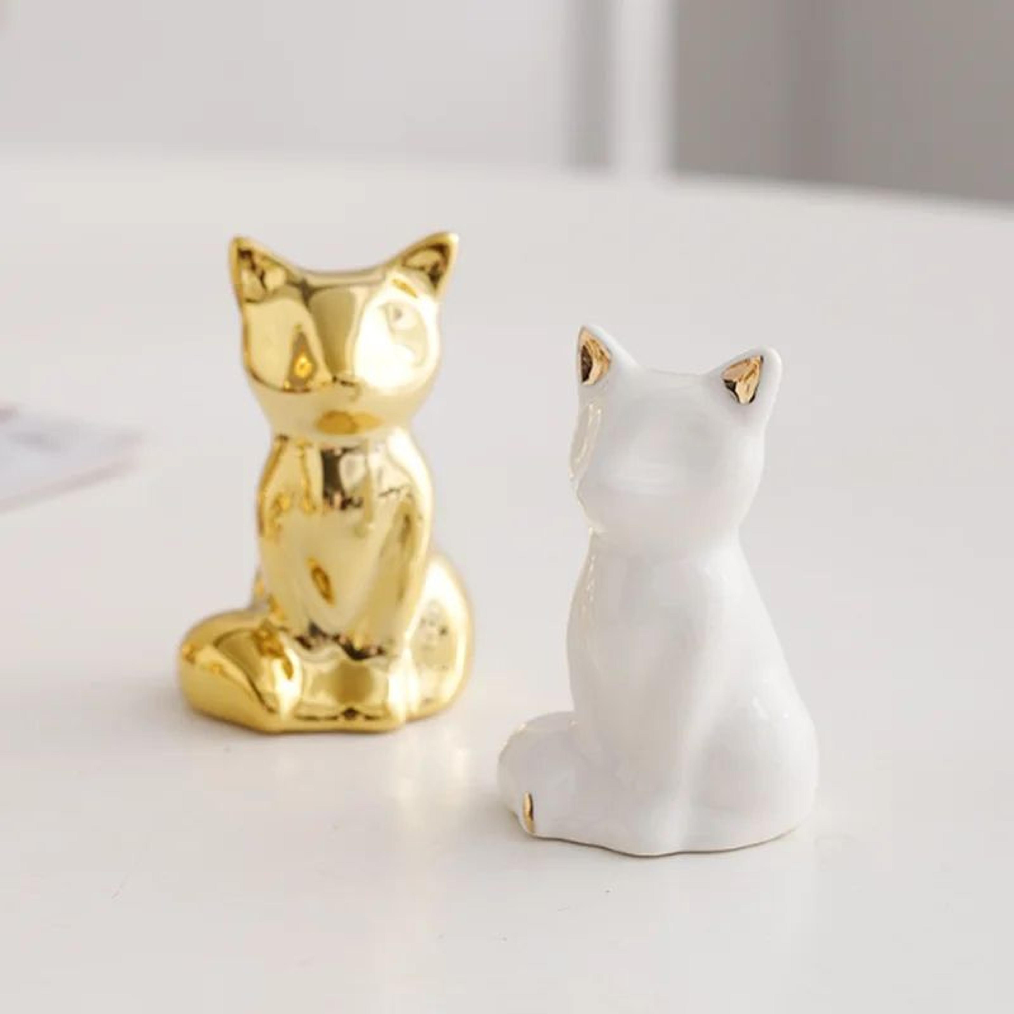 gold and white elephant statues set for shelves and modern home decor