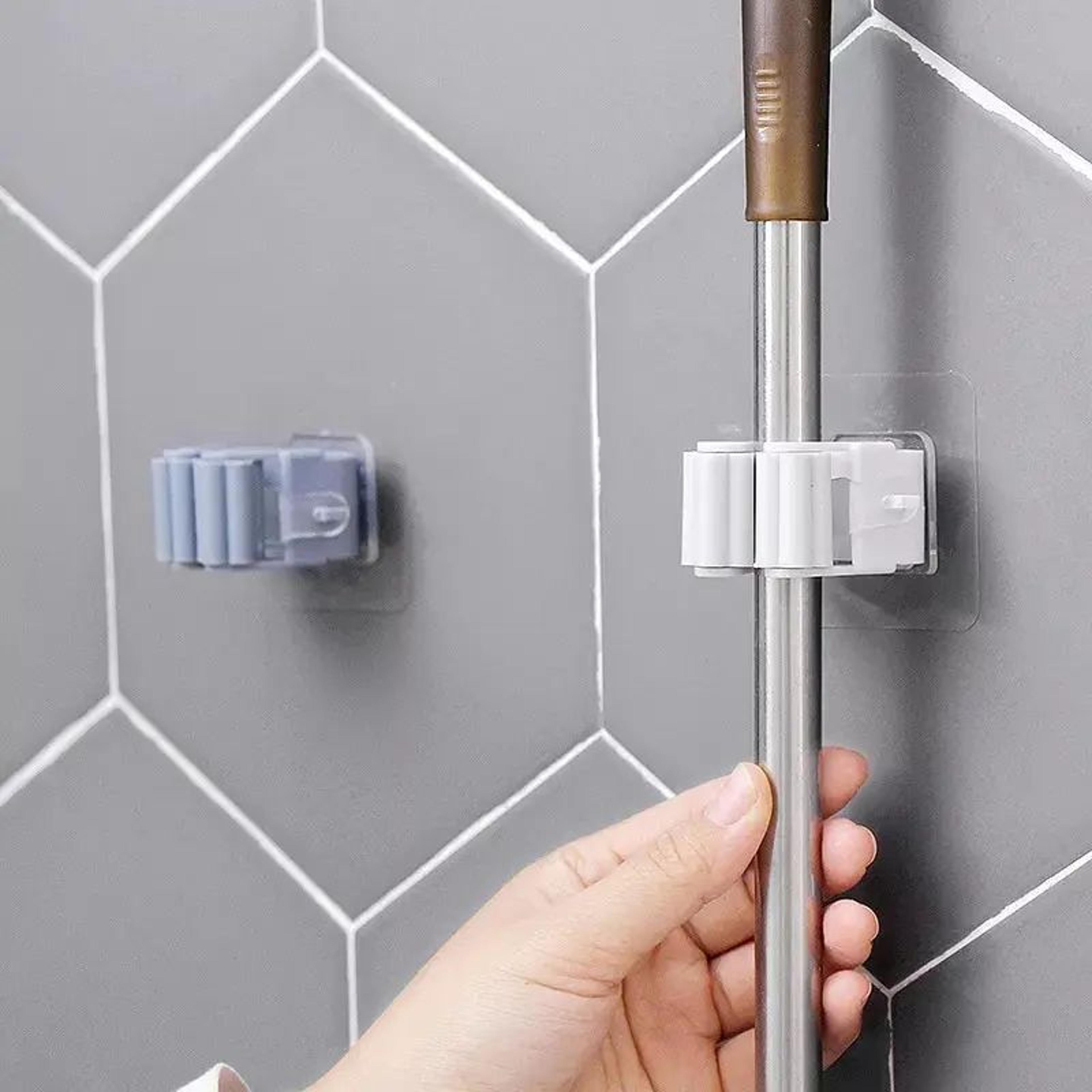gripnest self-adhesive wall mounted mop and broom holder