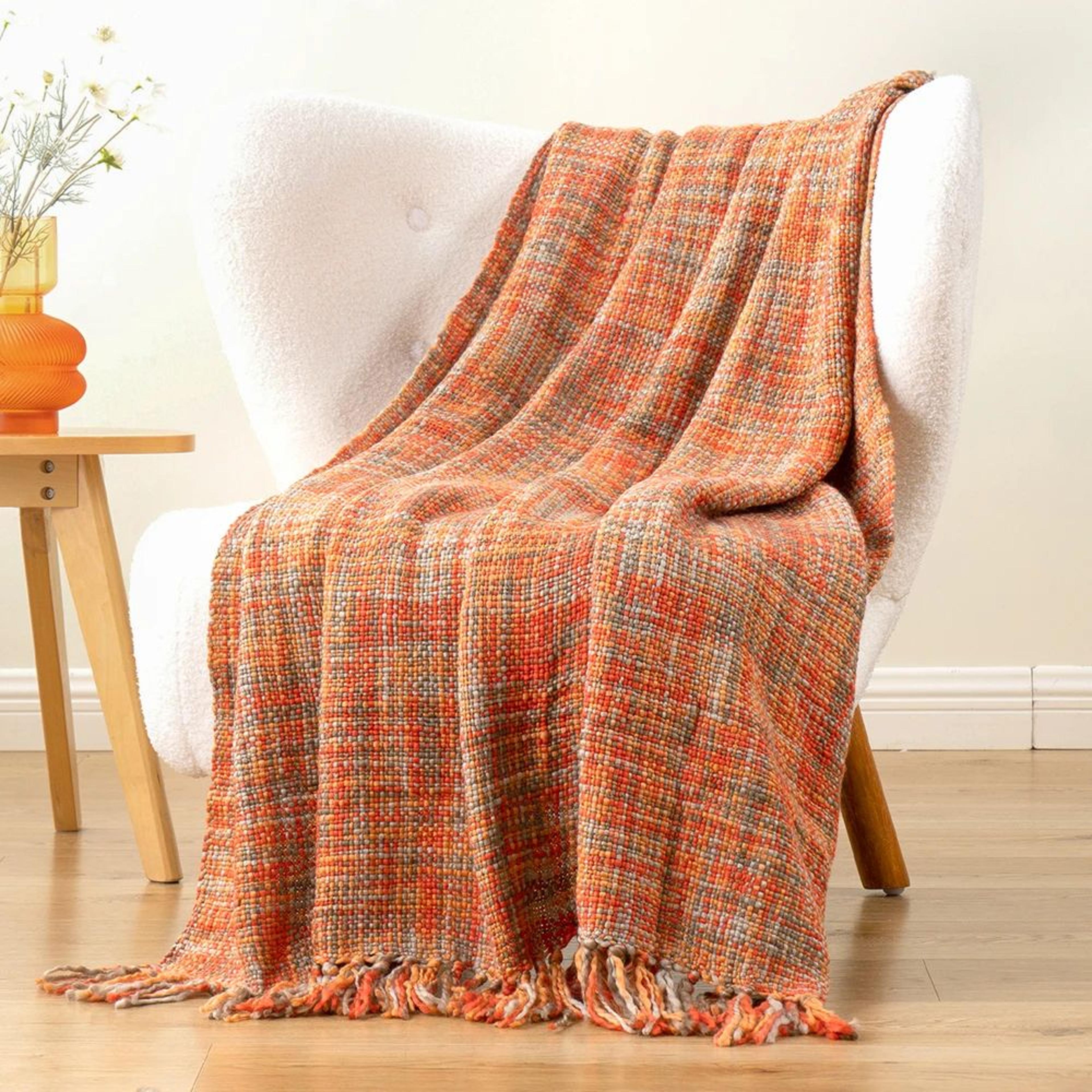 orange boho cable knit throw blanket with tassels for couch and bed