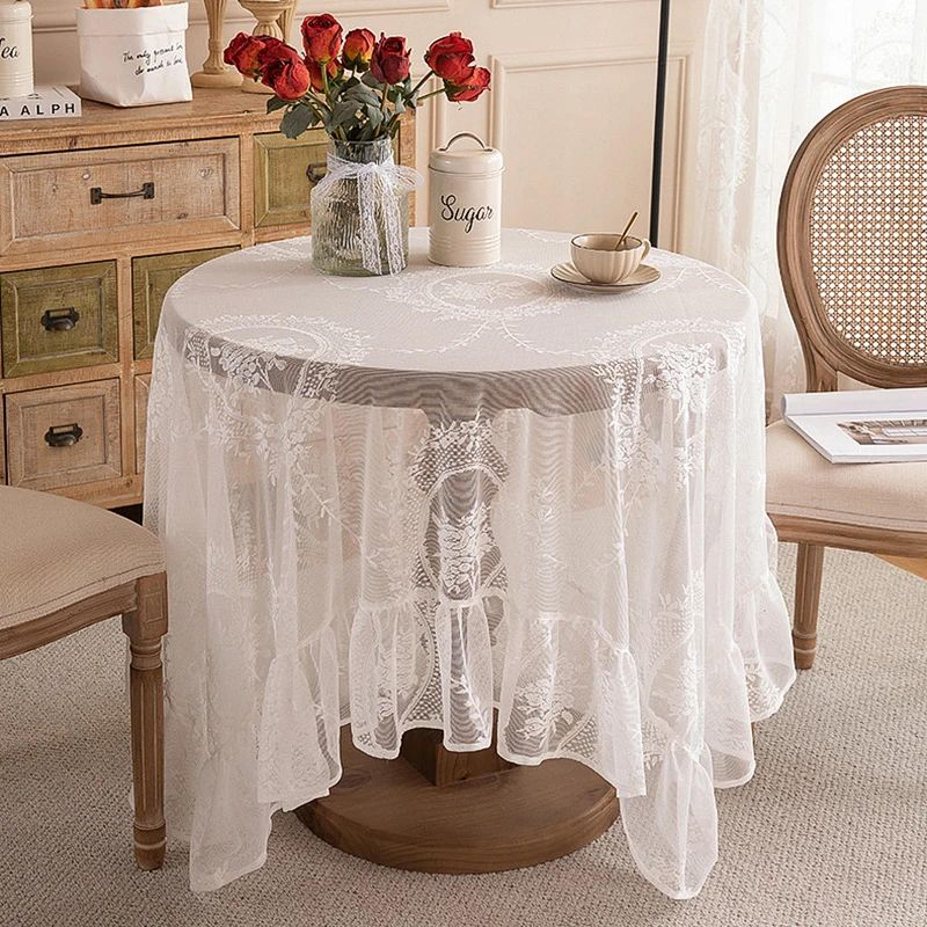 elegant white floral lace tablecloth for dining tables and weddings