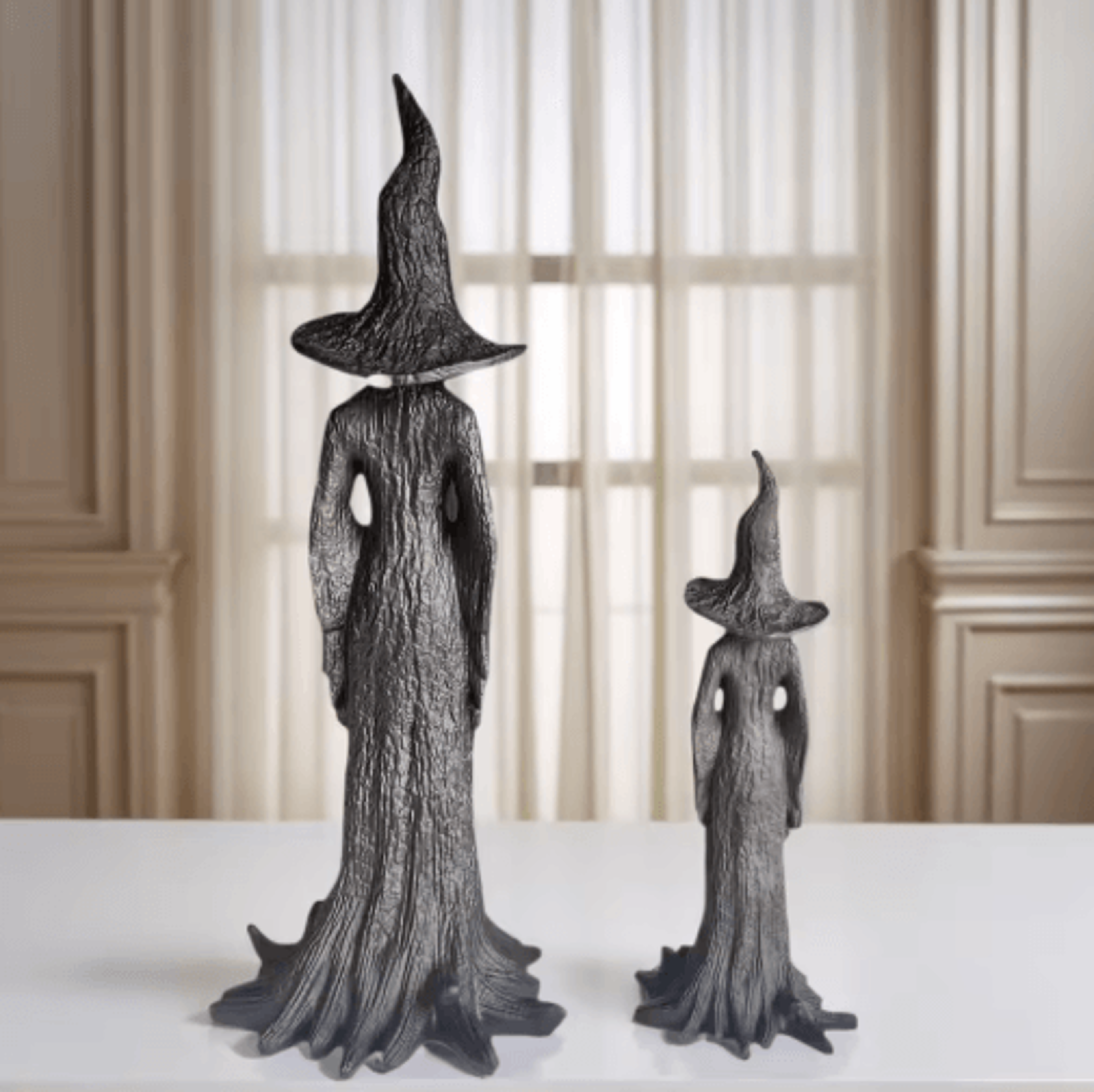 gothic witch statue with withered tree texture spooky halloween desktop decor