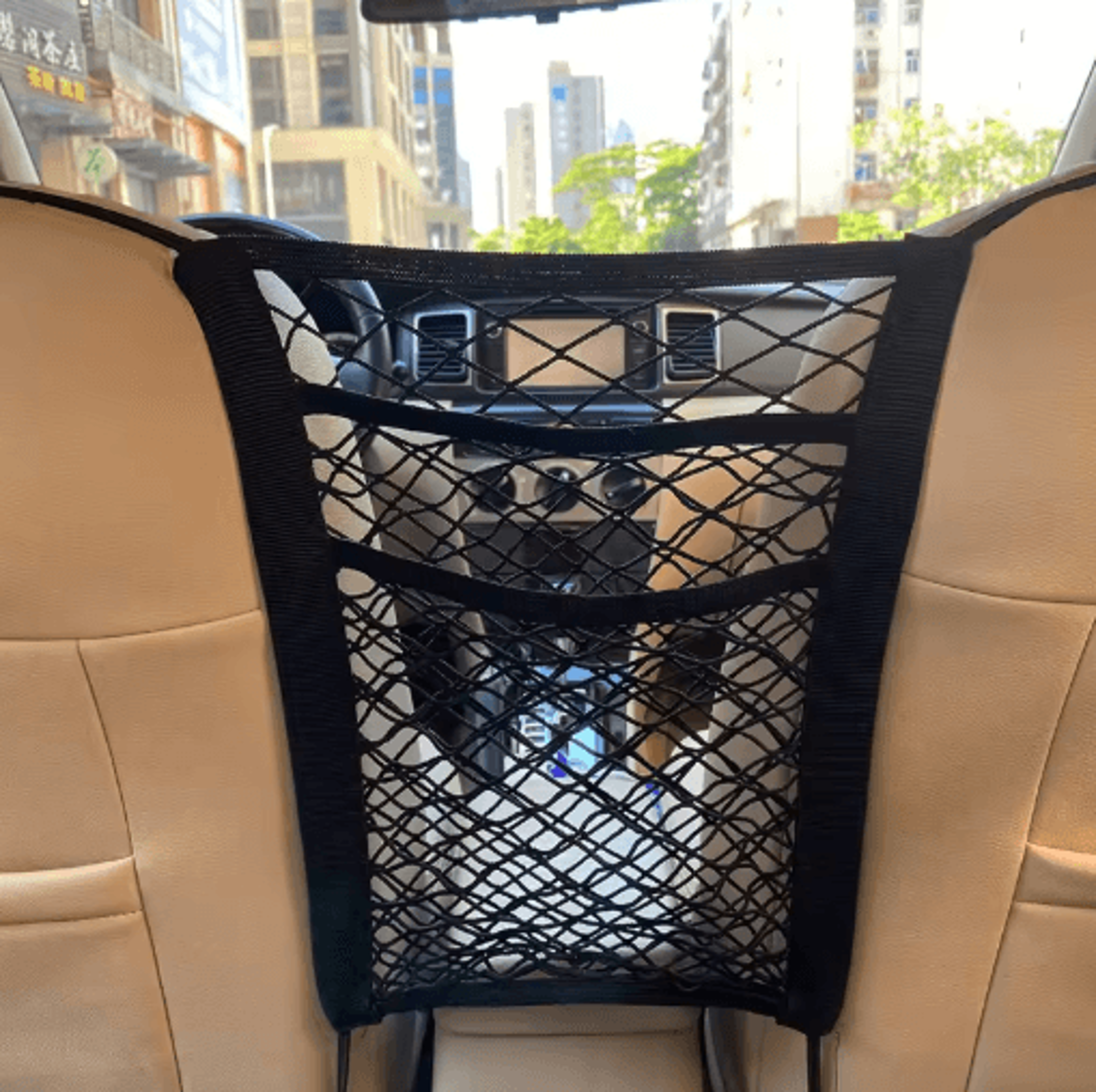 stretchable car storage net organizer between seats with pet barrier
