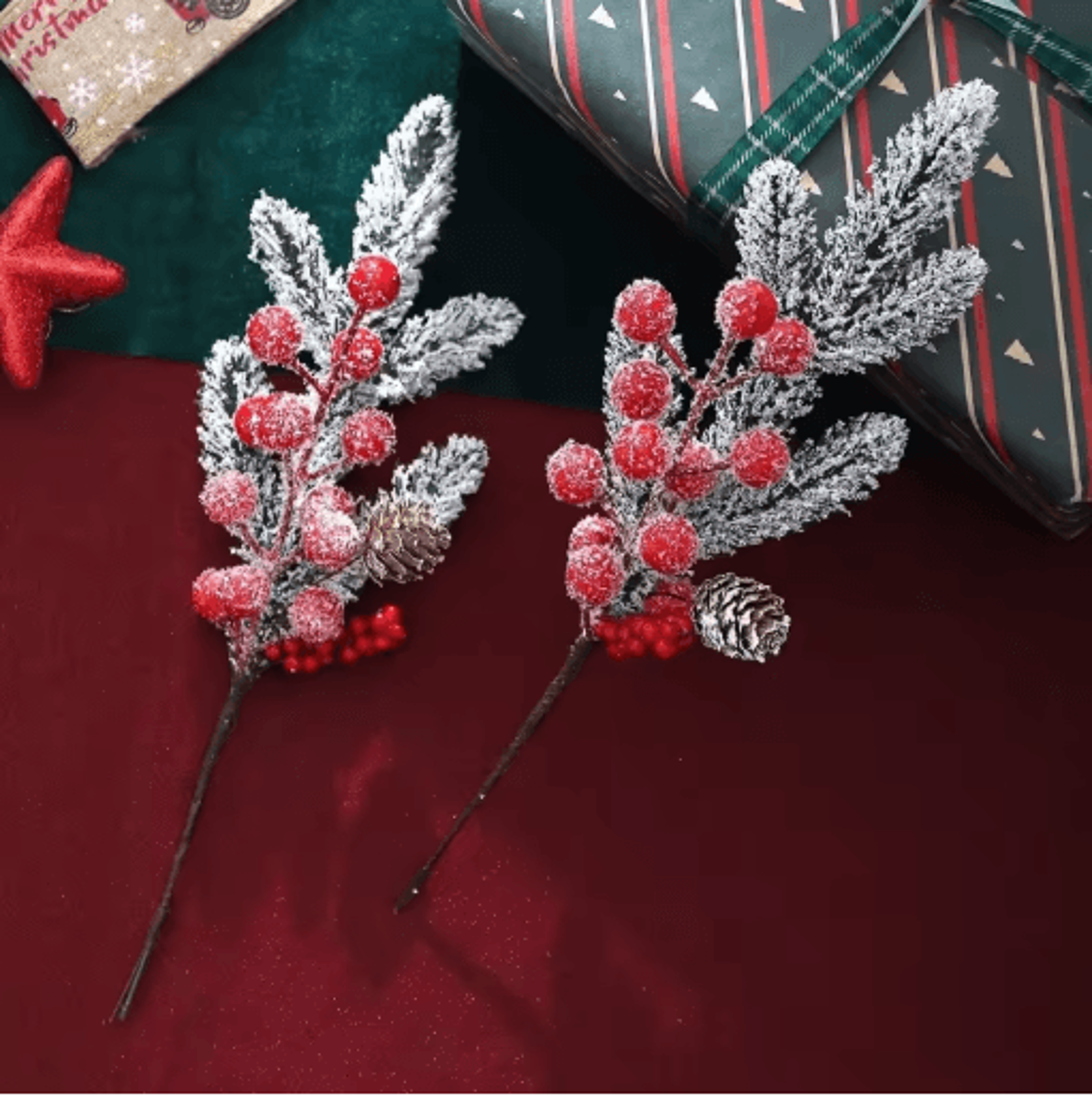 artificial pine branch with red holly berries christmas decoration