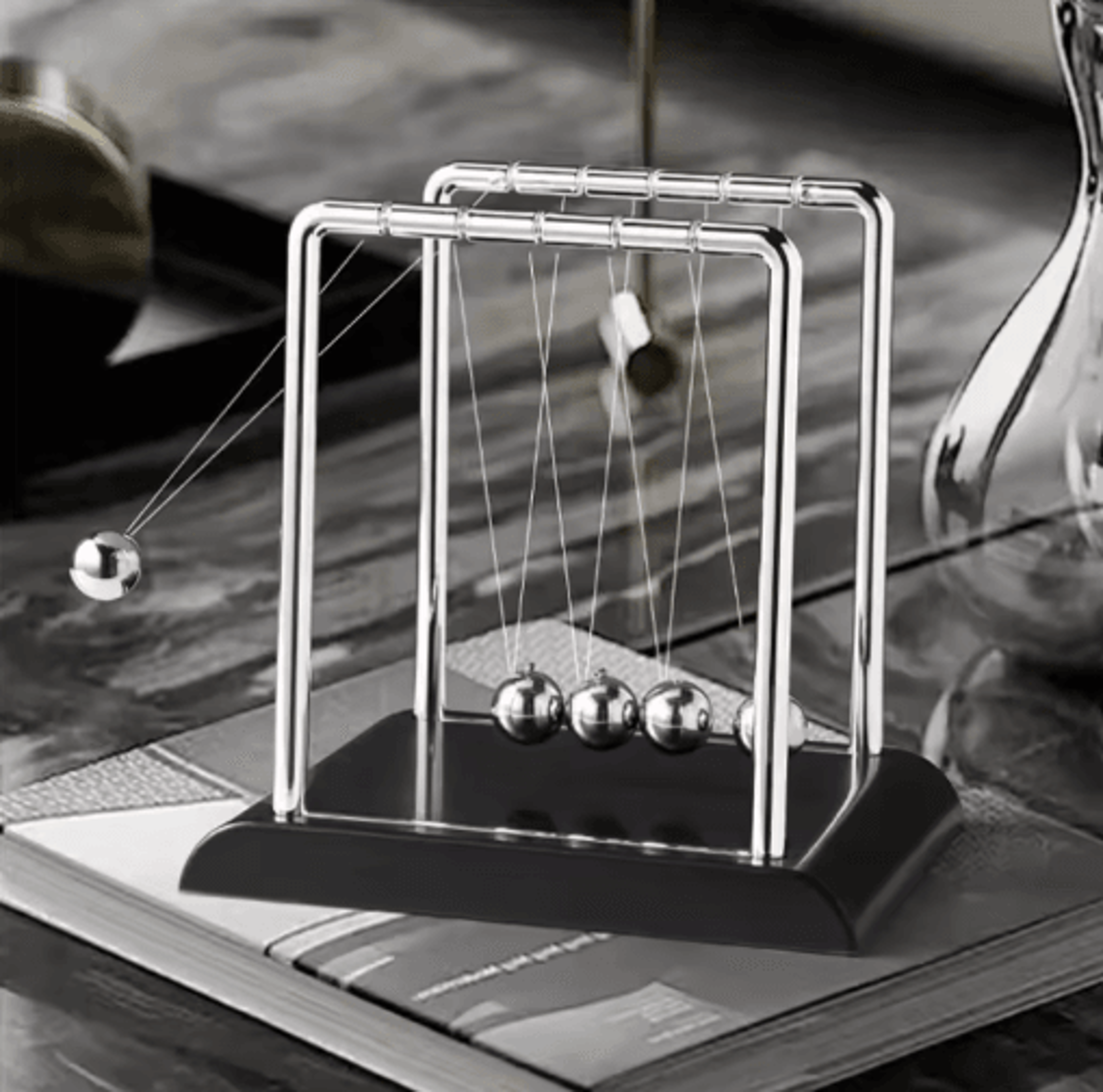 momentum flow newtons cradle classic physics pendulum desk toy & decor