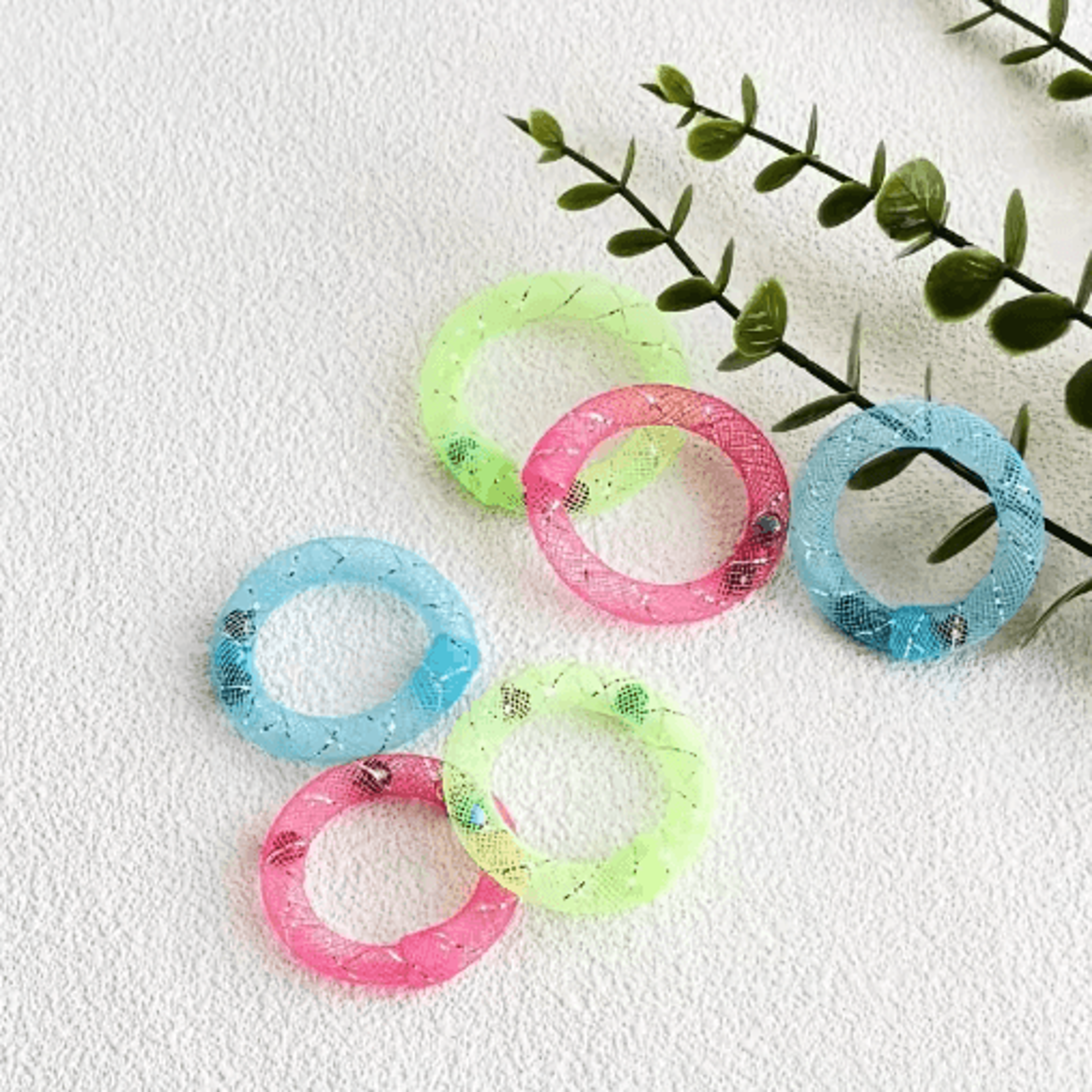 donut-shaped cat spring toy with bell for interactive bouncing fun