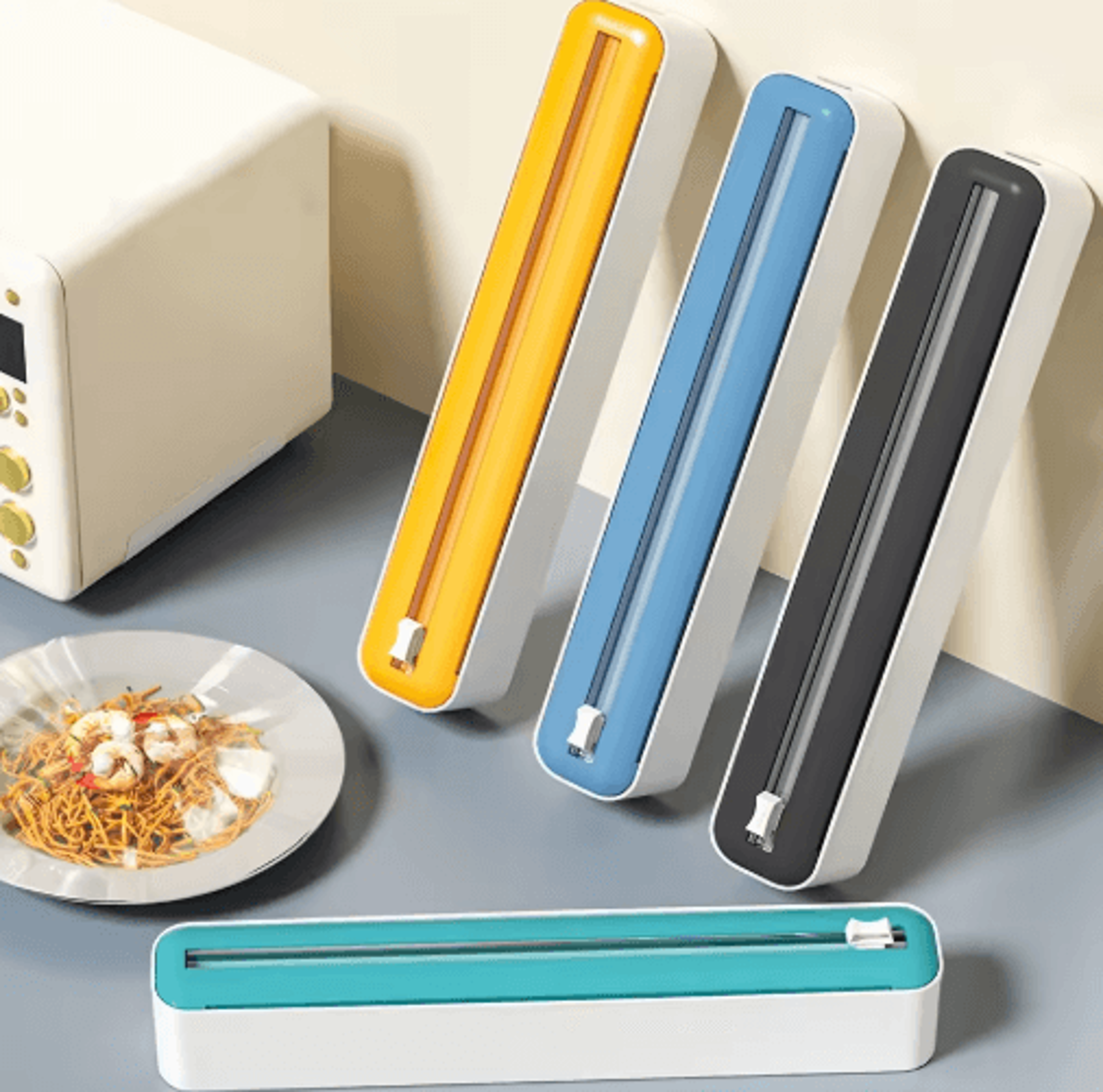 2-in-1 plastic wrap & foil dispenser with slide cutter for easy kitchen organization