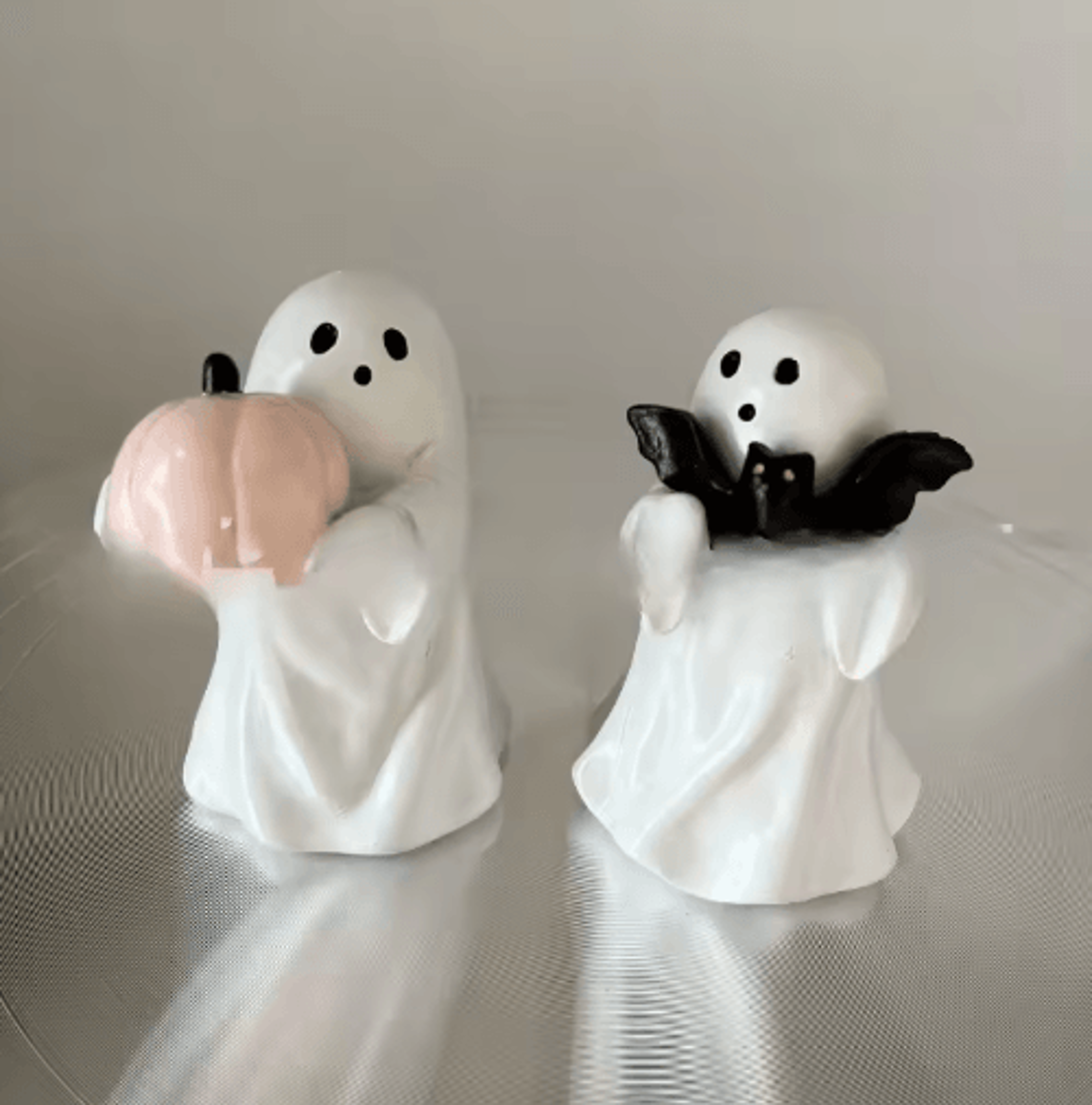 cute halloween ghost holding pink pumpkin – bat-themed decorative statue for home & party decor