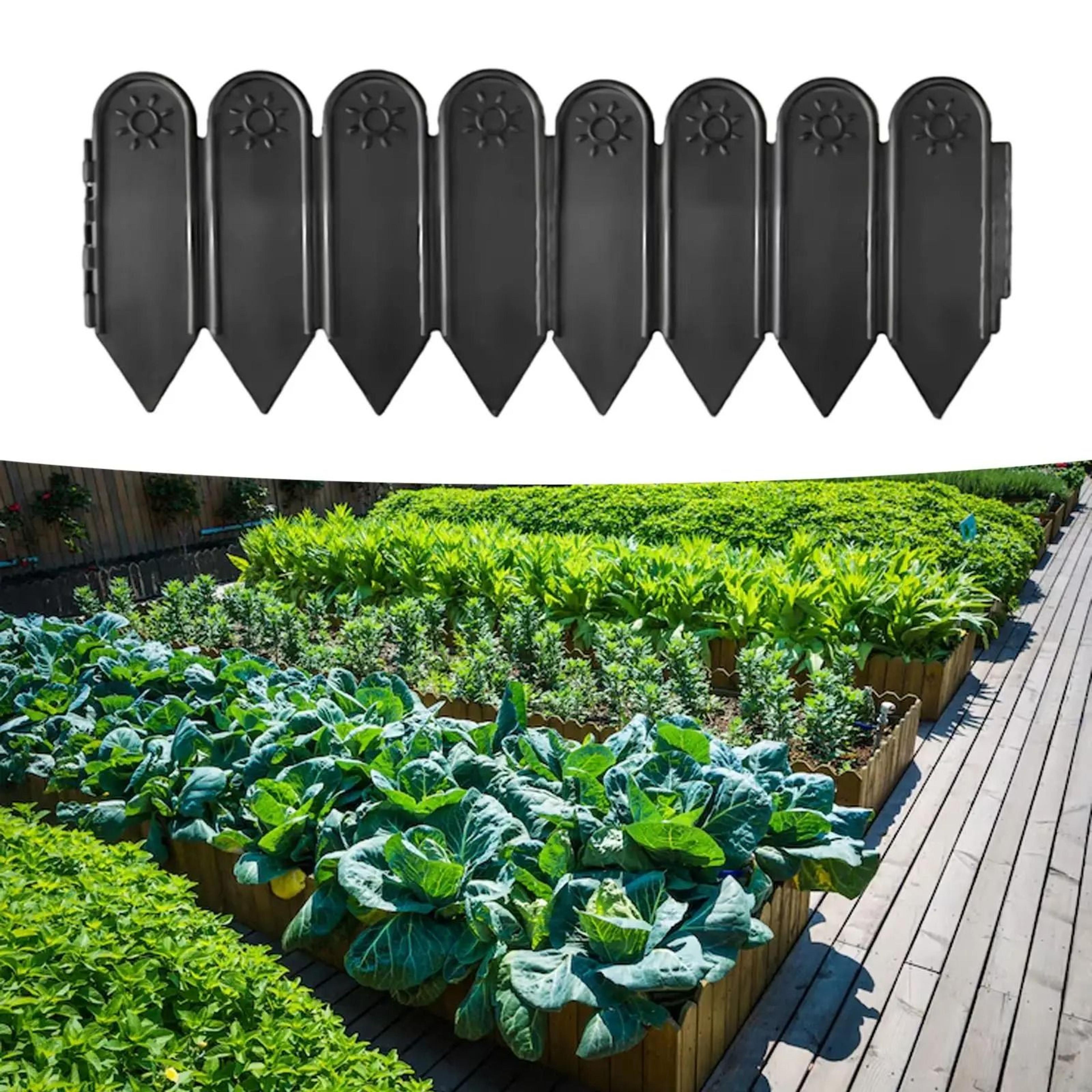 decorative garden fence border with stakes for flower beds and lawns