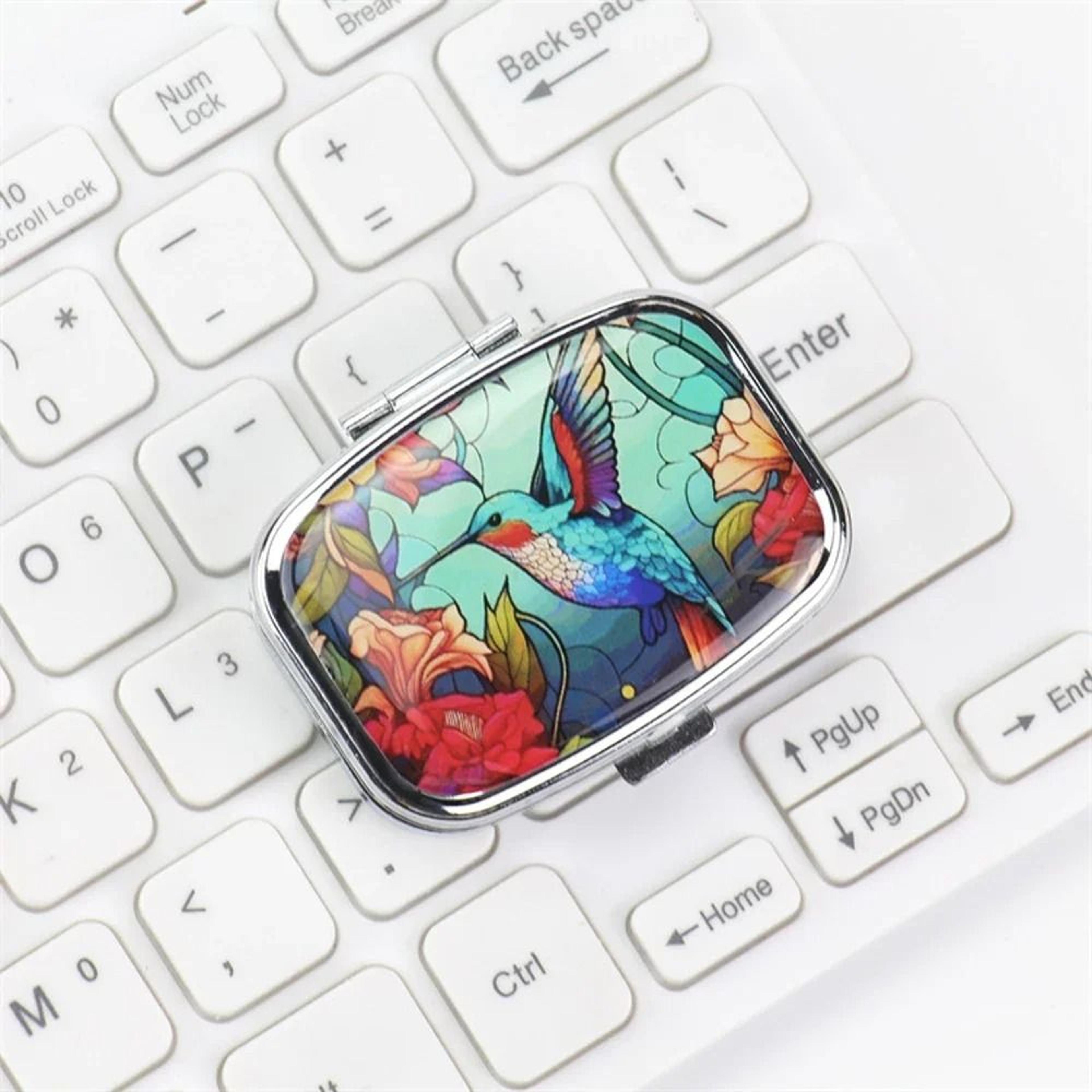 compact metal travel pill organizer and jewelry storage case