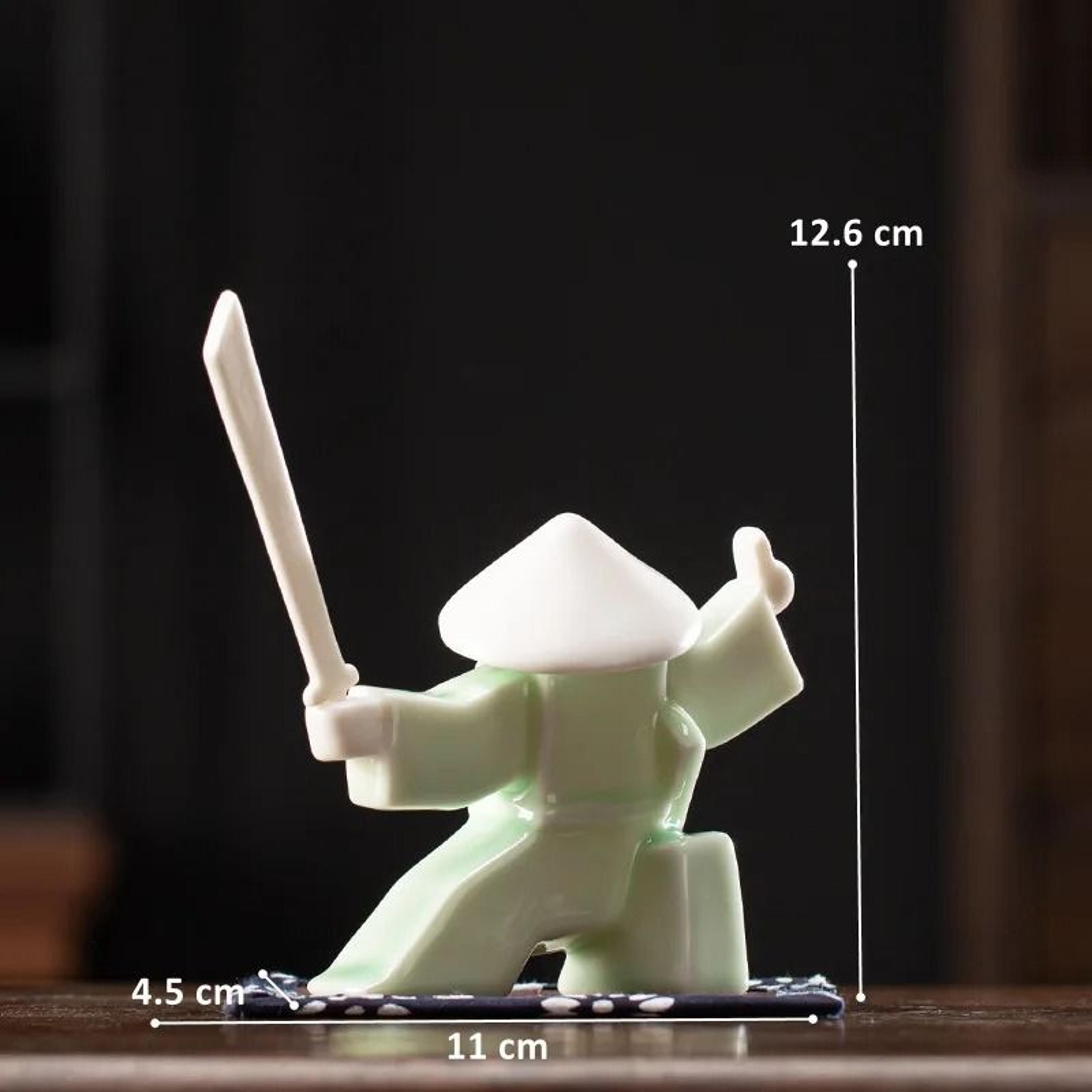 white ceramic samurai figurine geometric oriental warrior decor