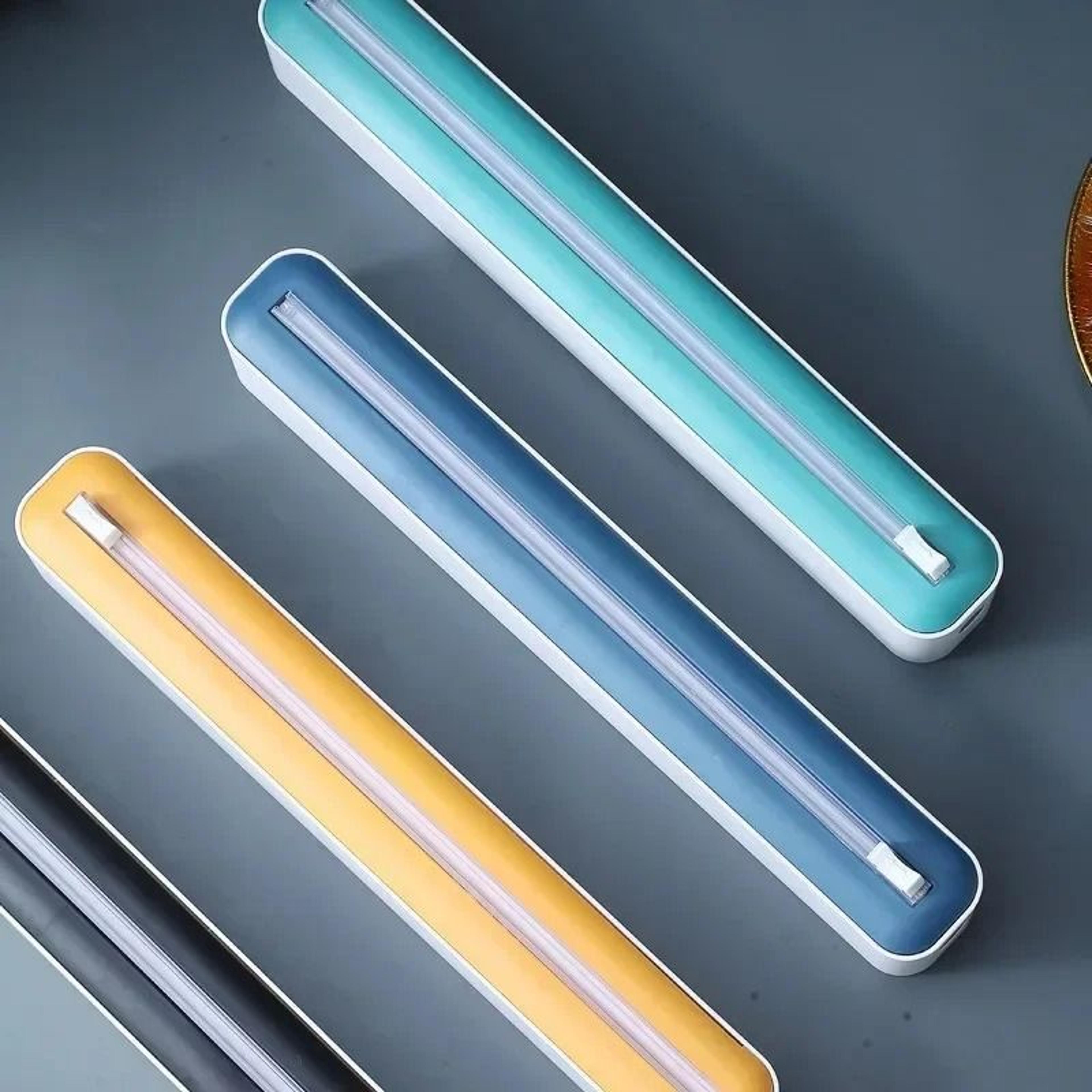 magnetic plastic wrap dispenser with slide cutter
