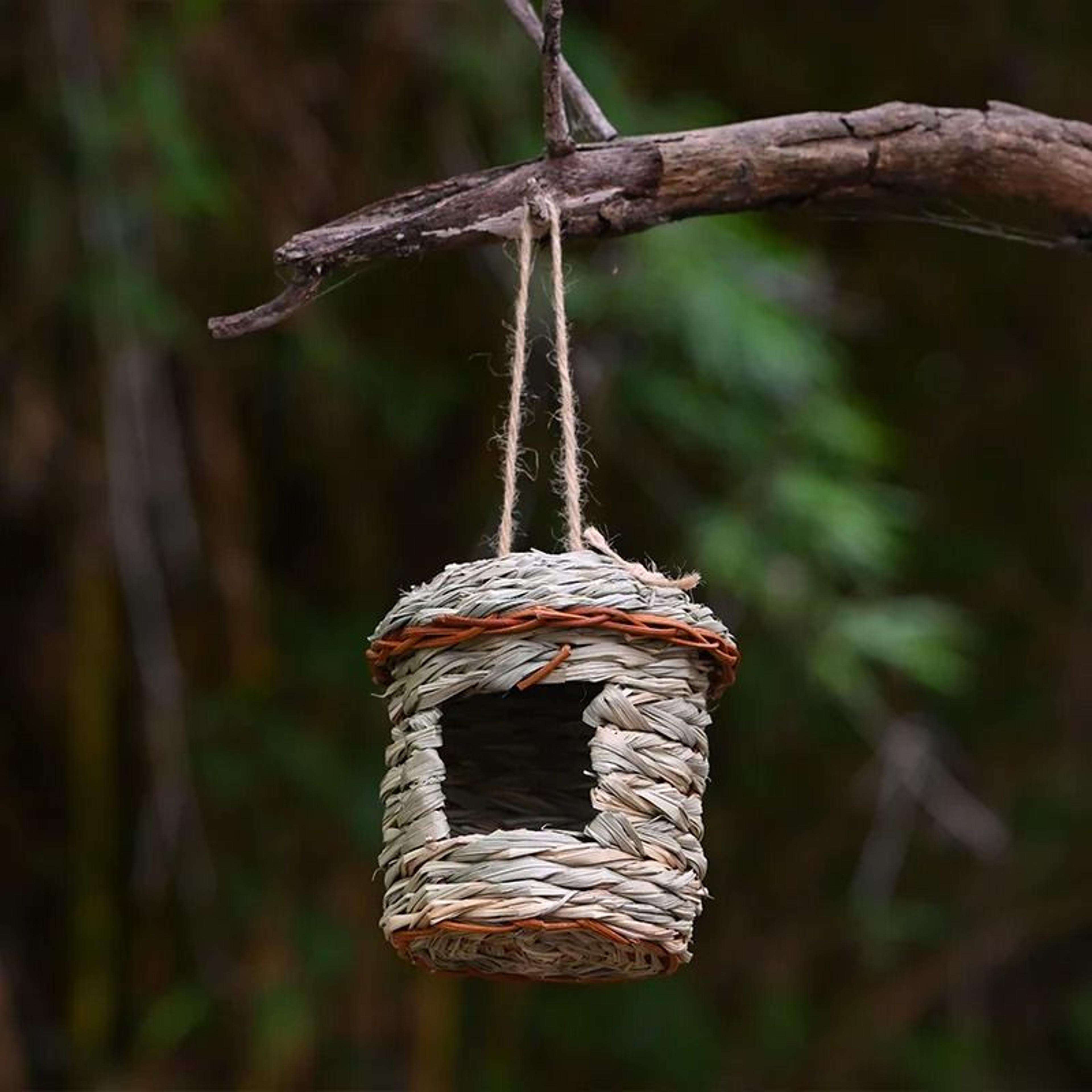 handwoven straw hanging bird nest and breeding hut