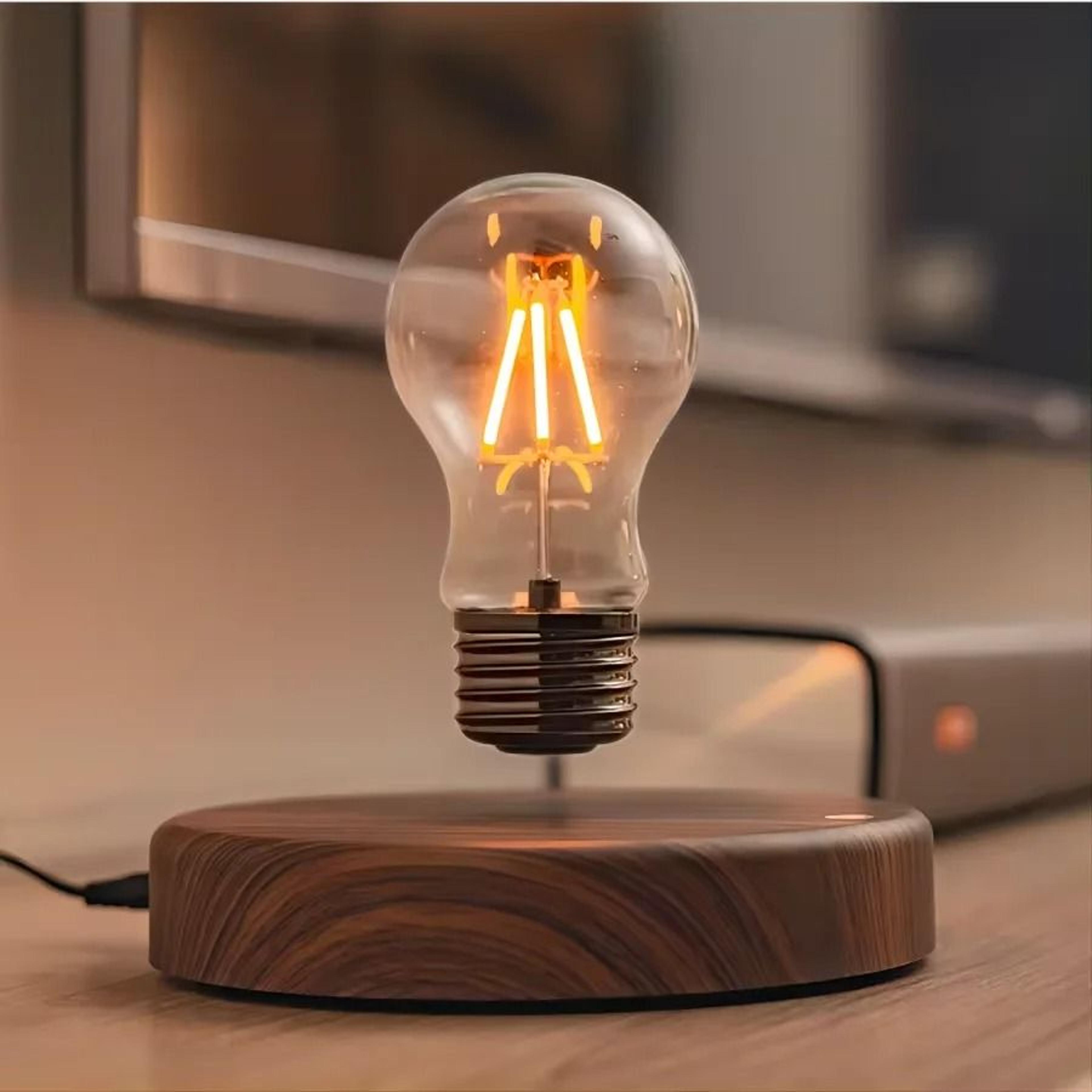 magnetic levitation glass bulb lamp creates floating light for modern desks