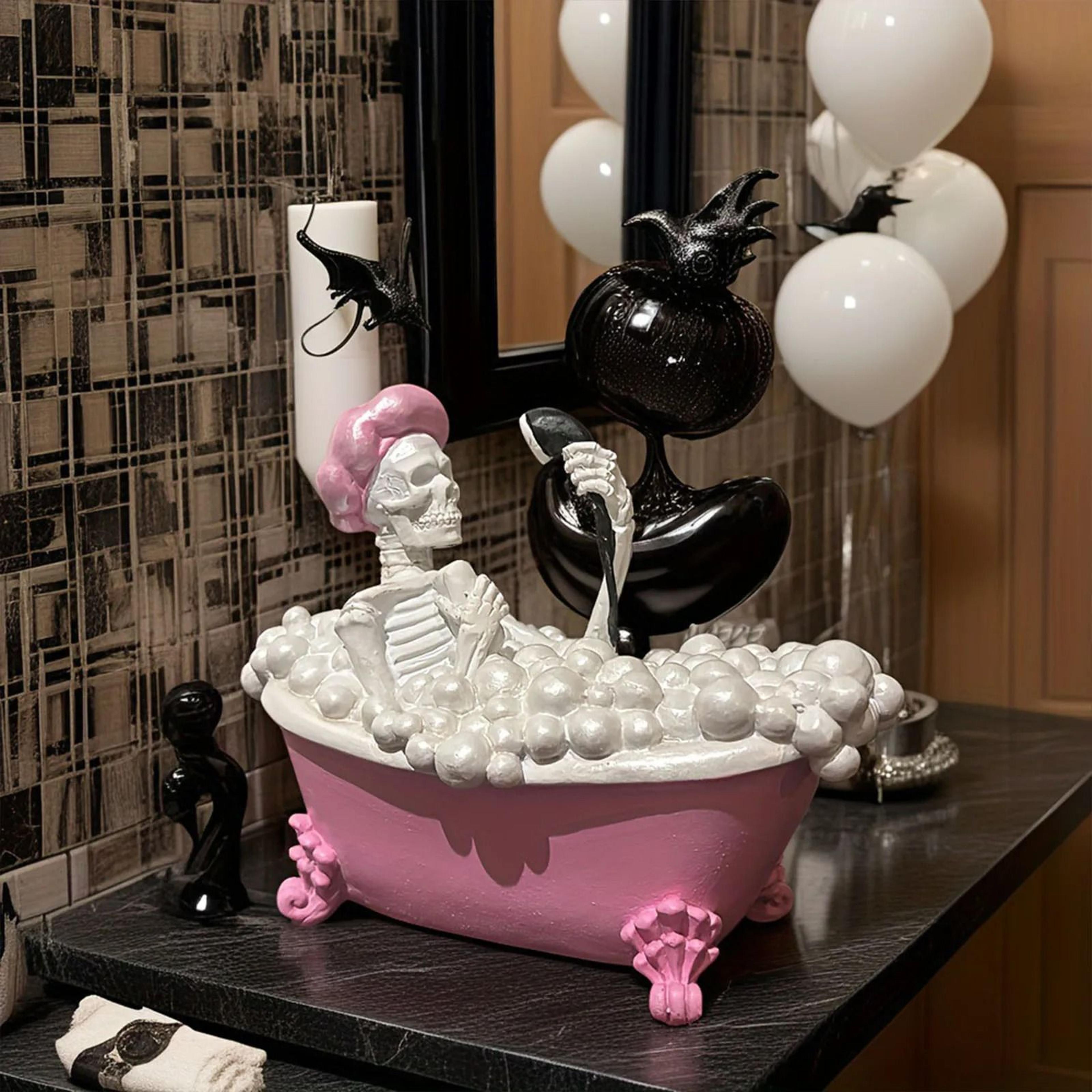 pink bathtub skeleton figurine adds playful spooky charm to bathroom decor
