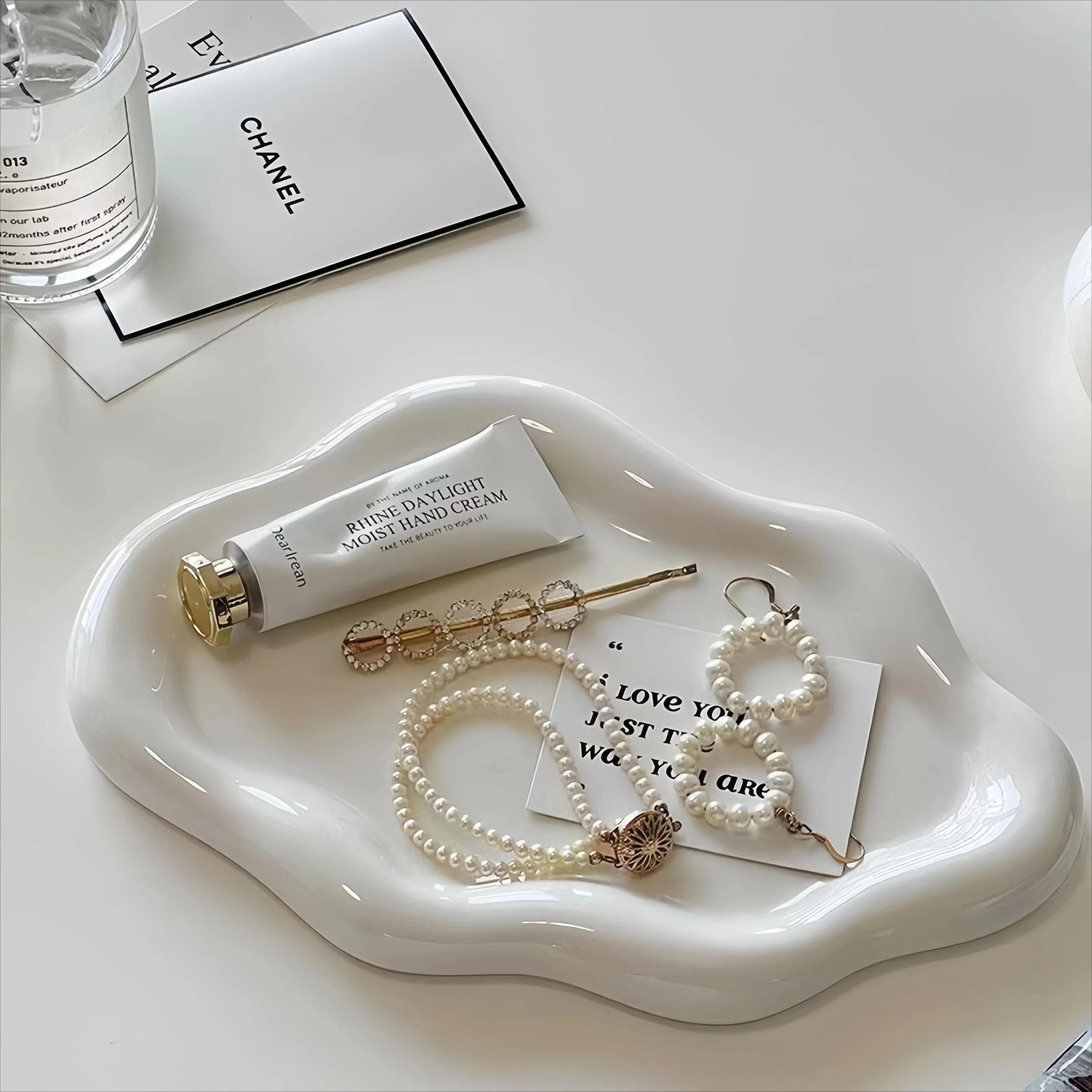 decorative plastic jewelry tray keeps small accessories stylishly organized and displayed