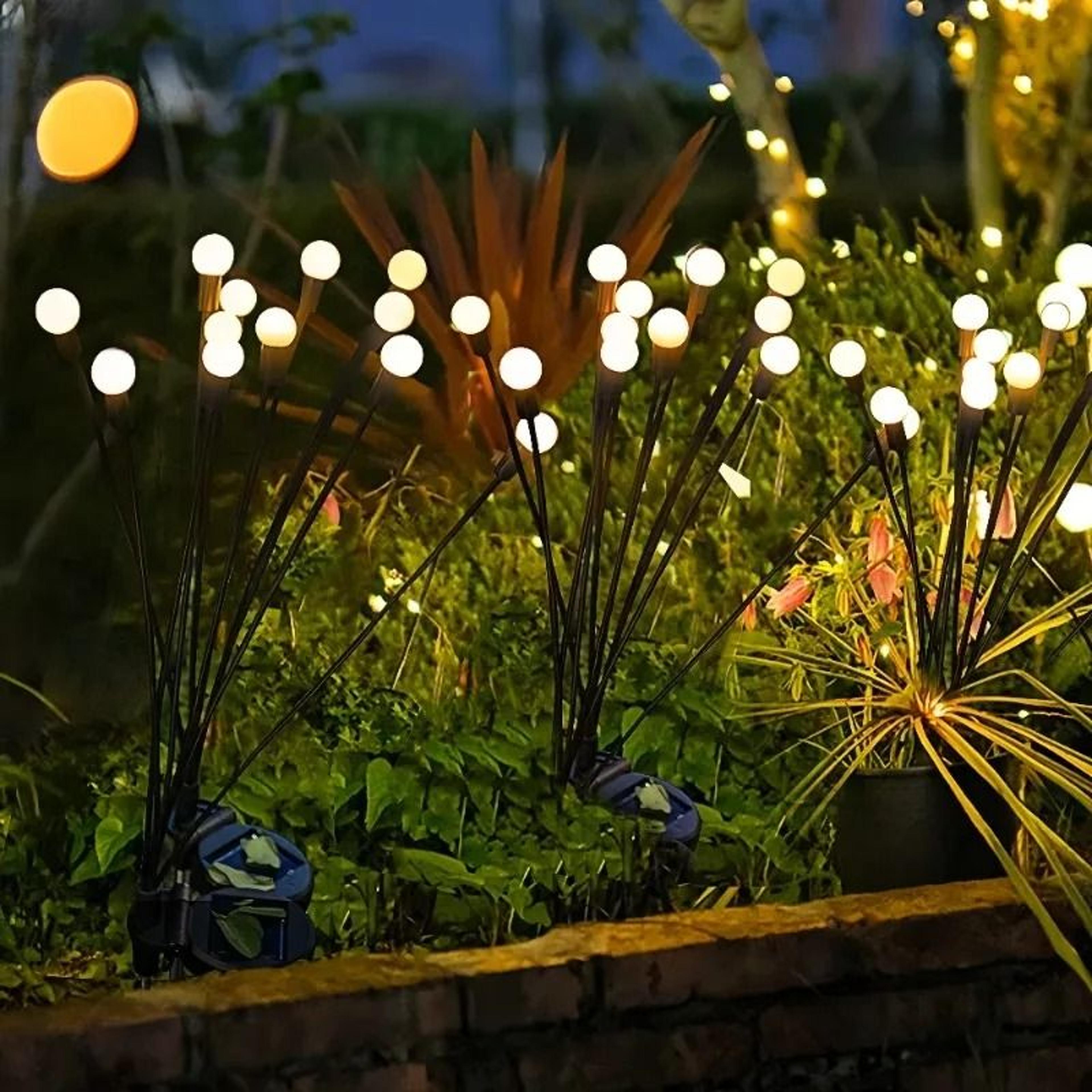 outdoor solar firefly garden lights create swaying glow every night naturally