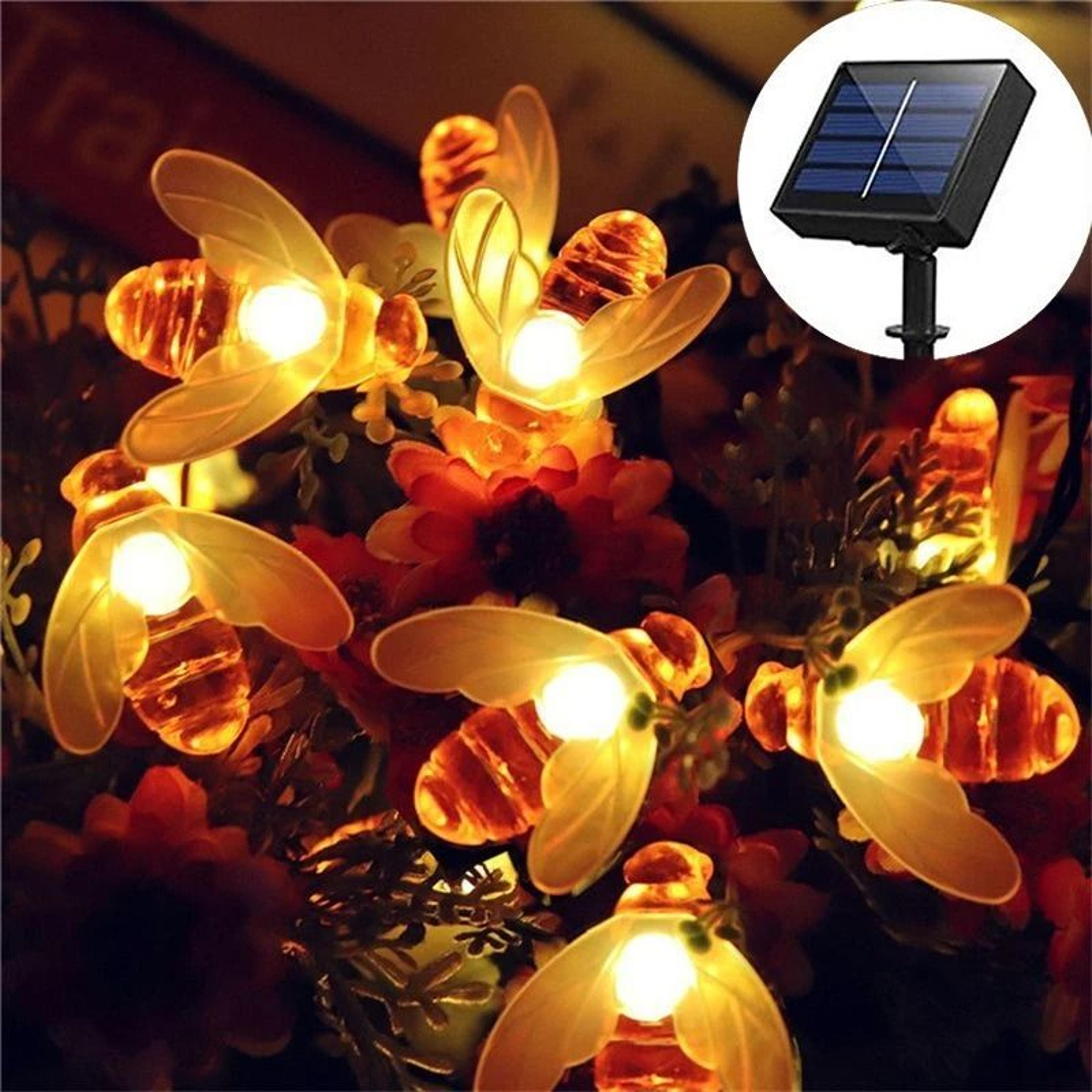 solar bee fairy string lights add playful glow to gardens celebrations