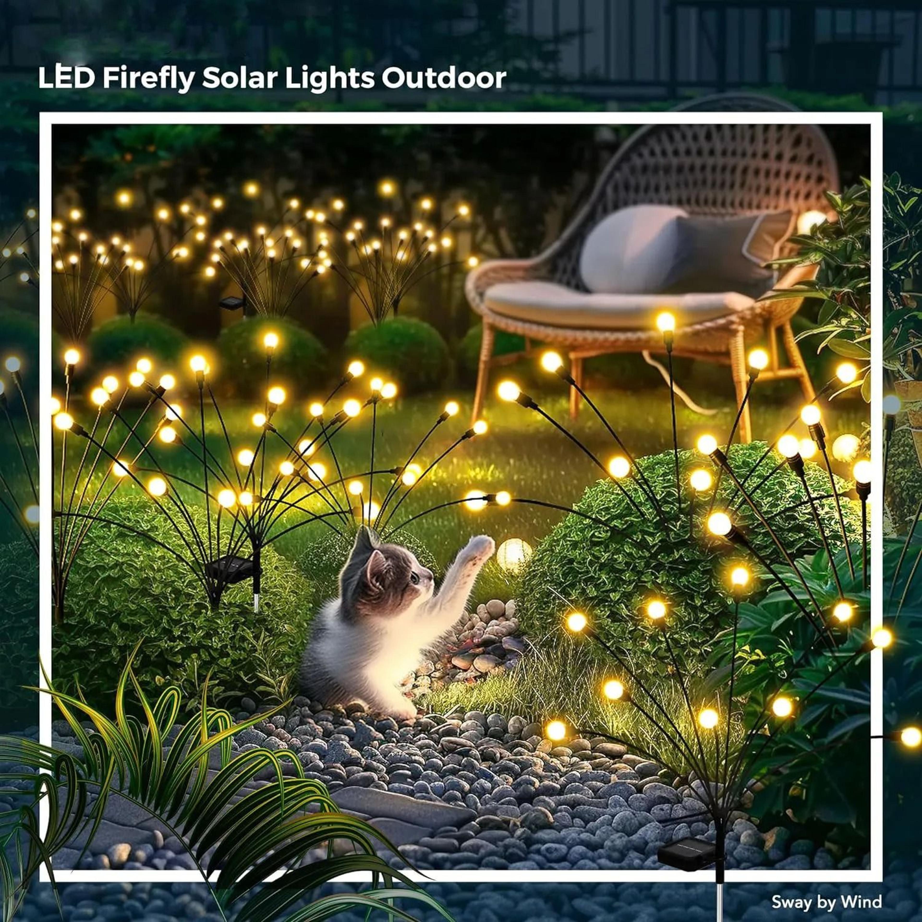solar swaying garden lights create firefly glow across patios paths yards