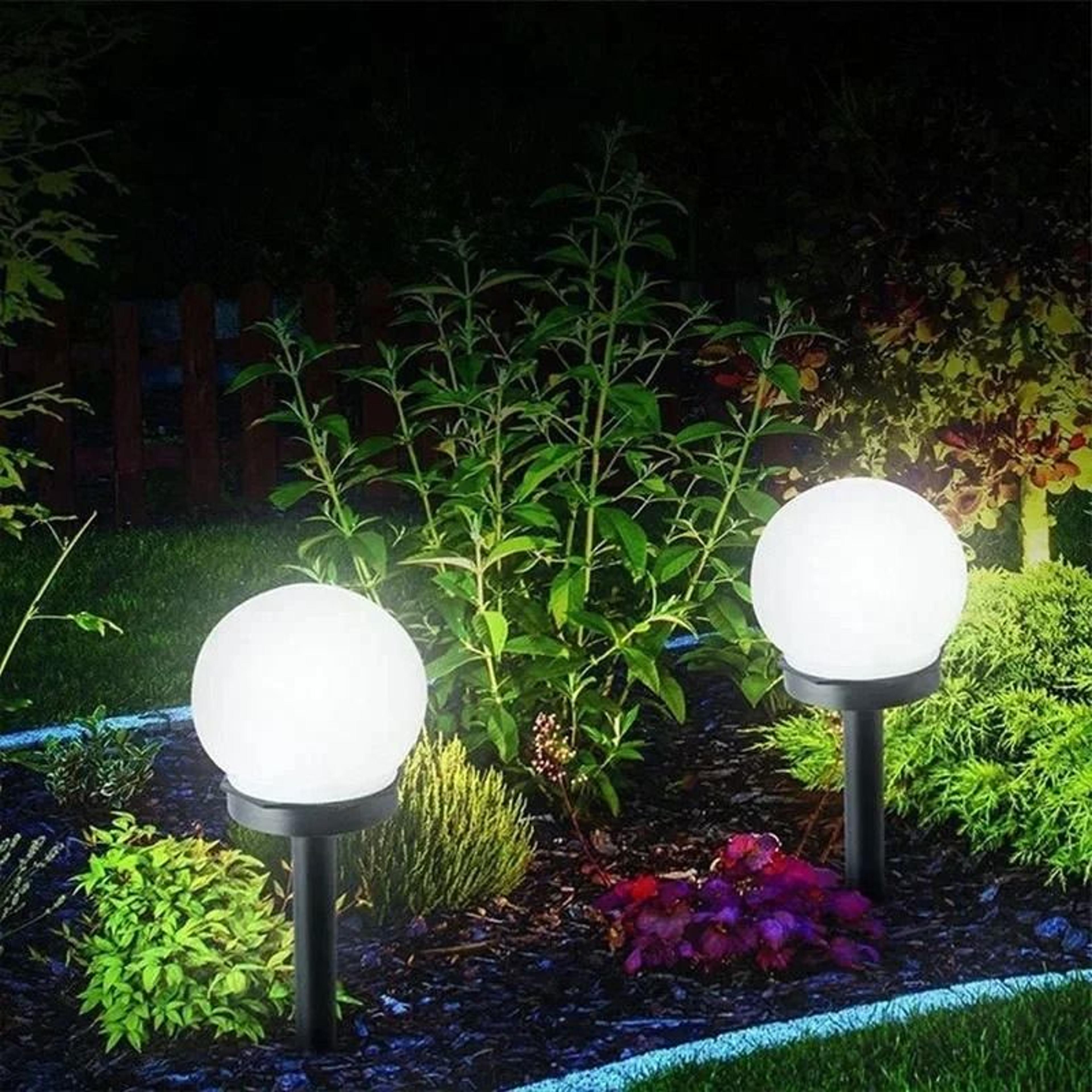 solar round ball garden lights create waterproof glow for lawns pathways