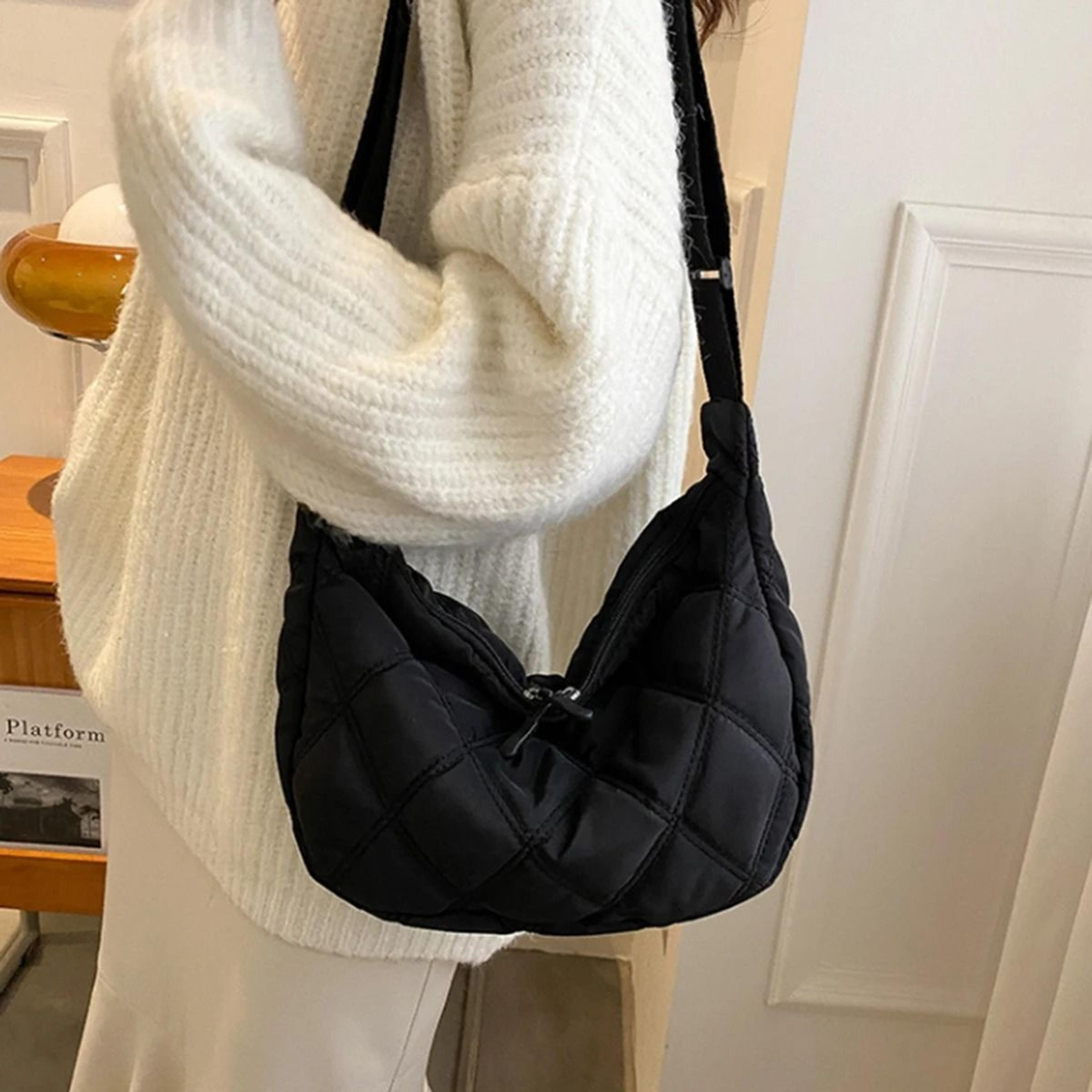 black quilted dumpling bag with large capacity crossbody shoulder design for women