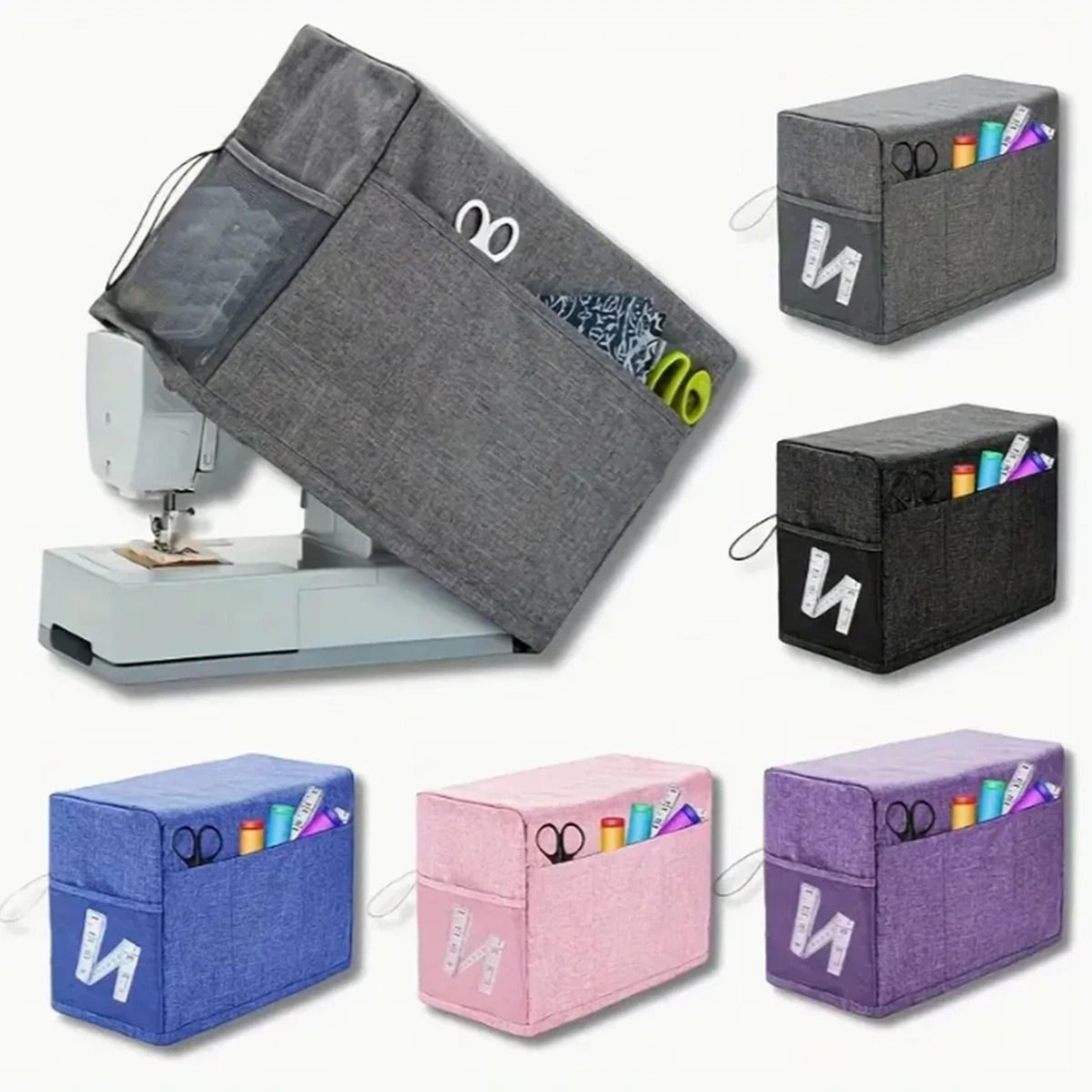 gray sewing machine dust cover with tool storage pockets
