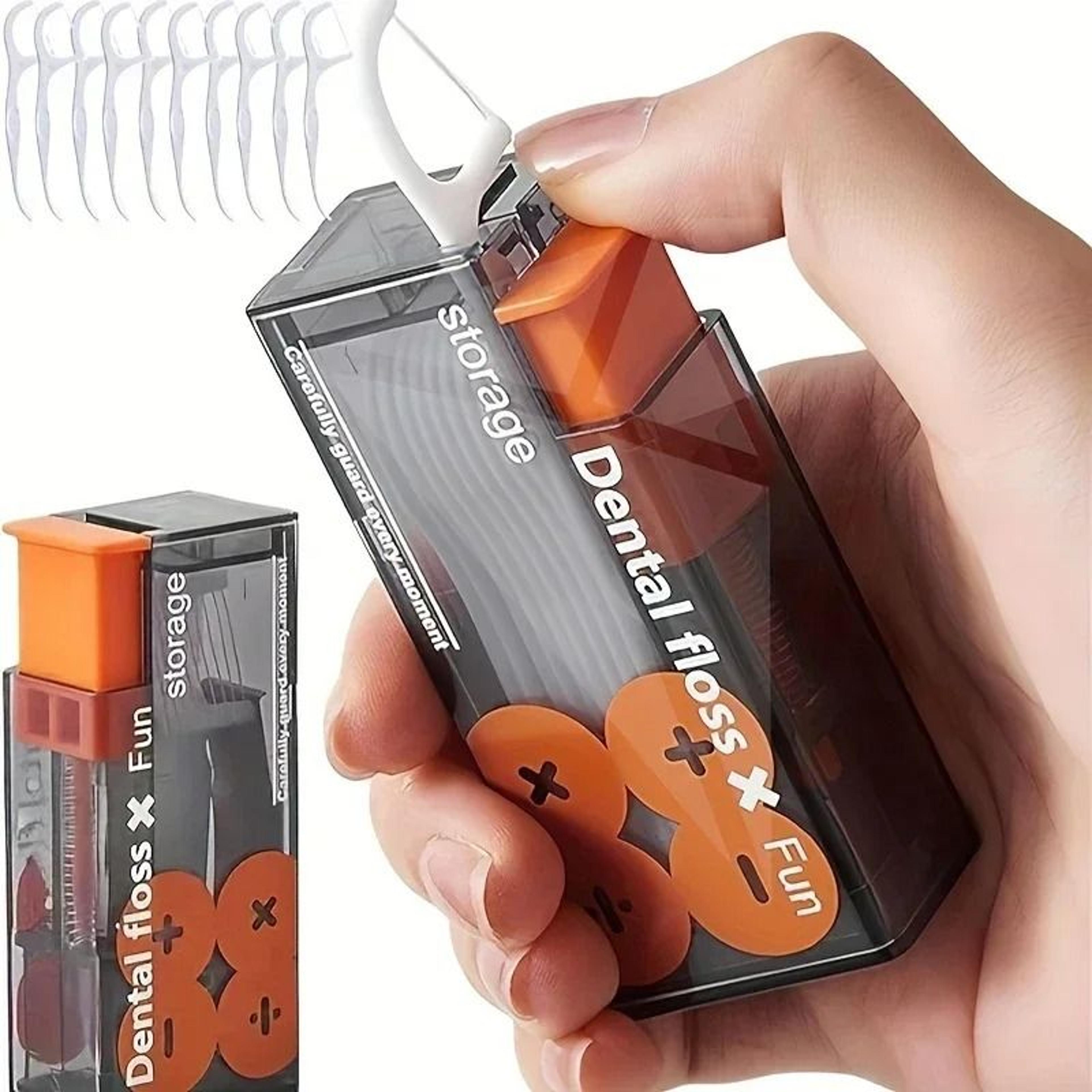 automatic pop up dental floss dispenser for portable oral care
