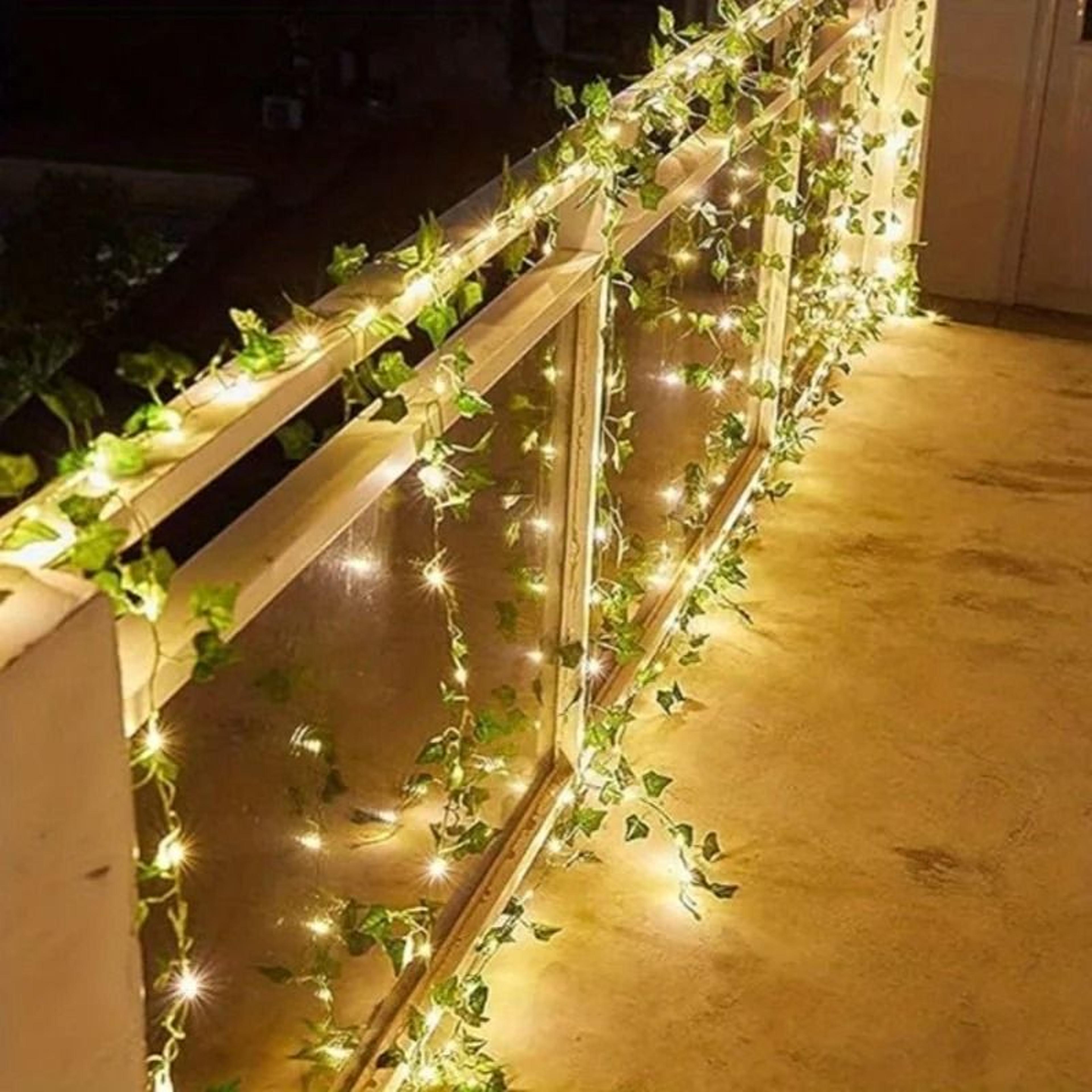 realistic green leaf solar vine string lights for garden and wedding decor