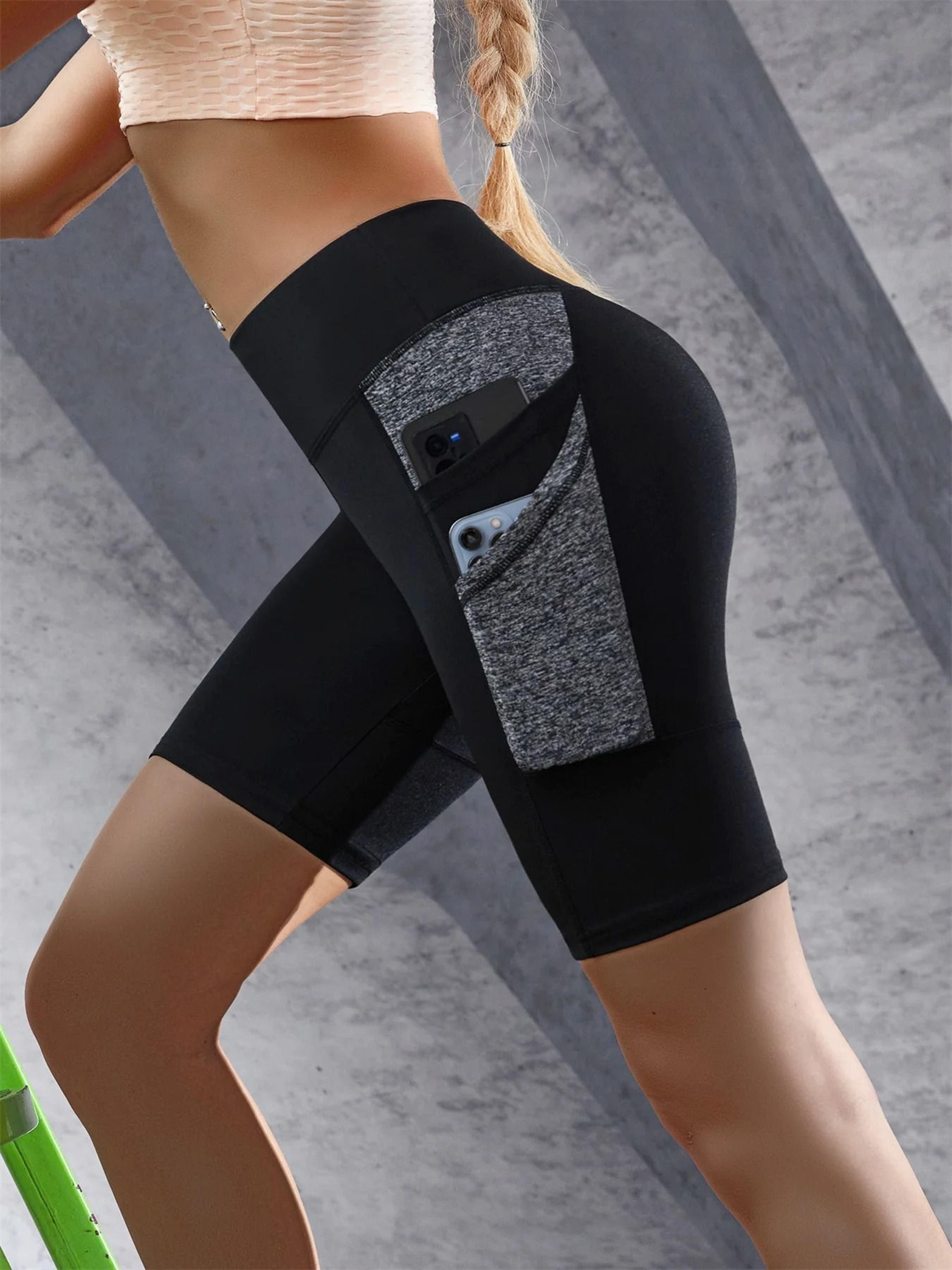 womens high waist yoga shorts with double side pockets and colorblock design
