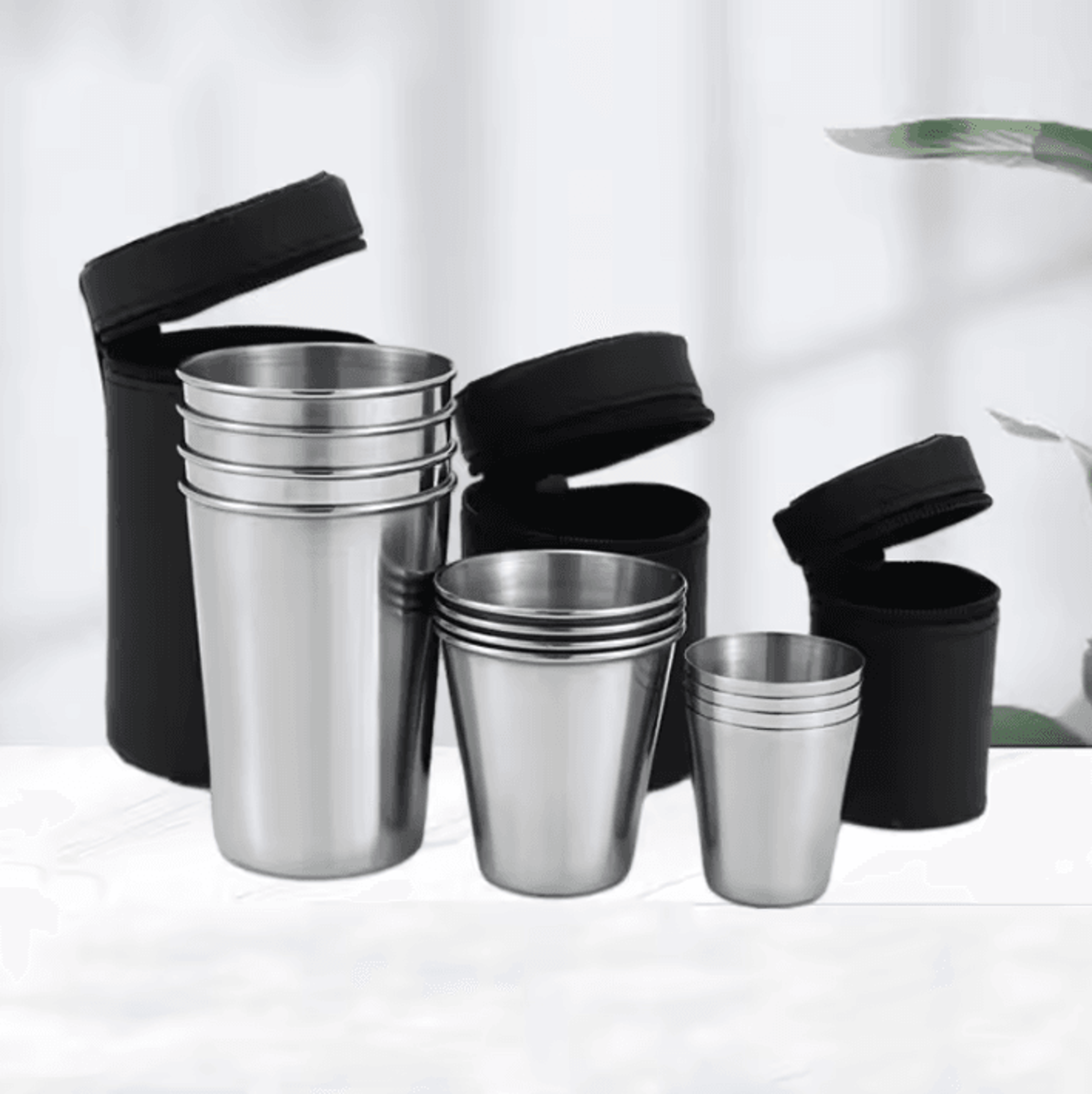 4-piece stainless steel travel cup set with portable carrying case