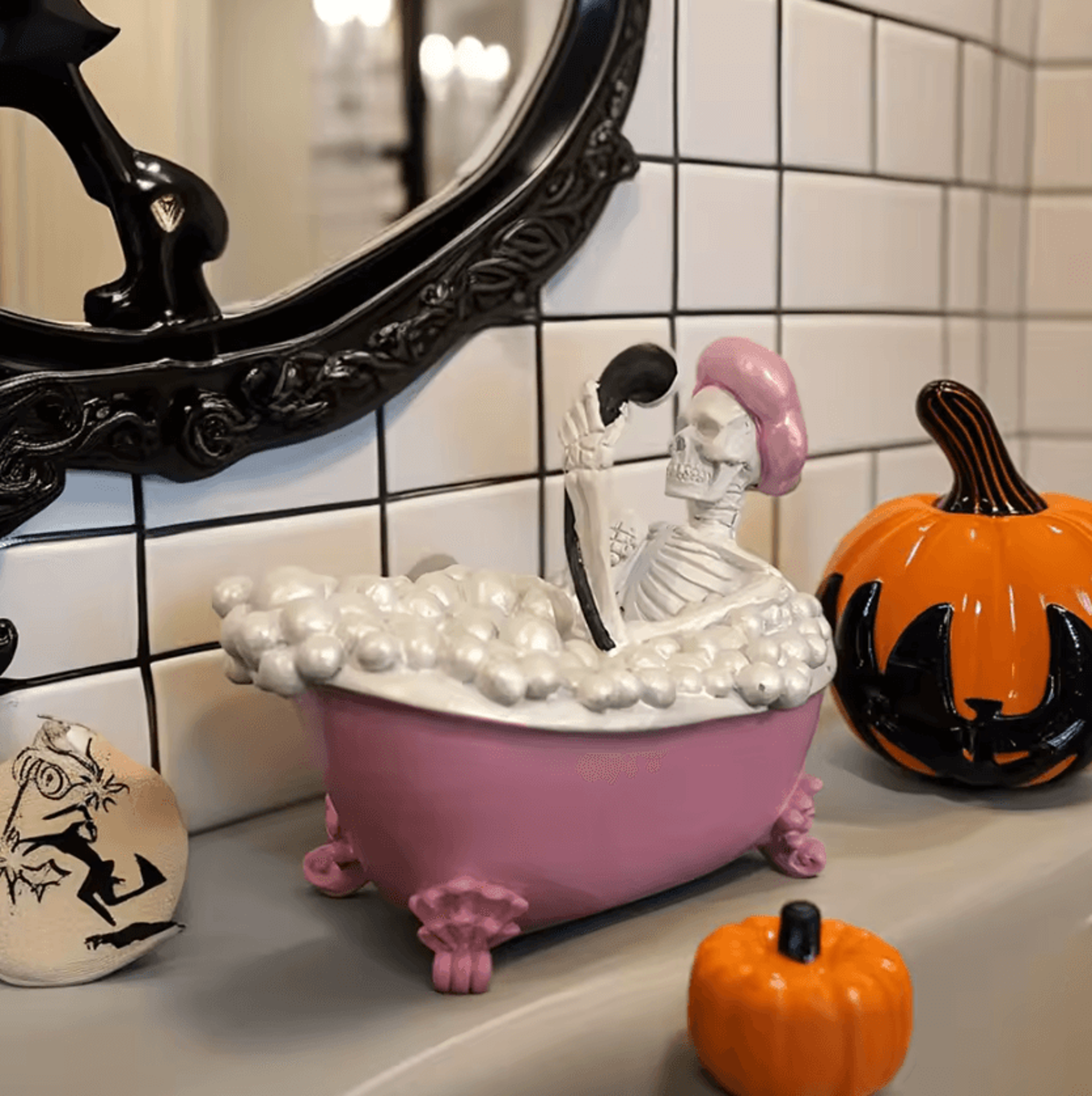 spooky skeleton in pink and white bathtub halloween decorative figurine