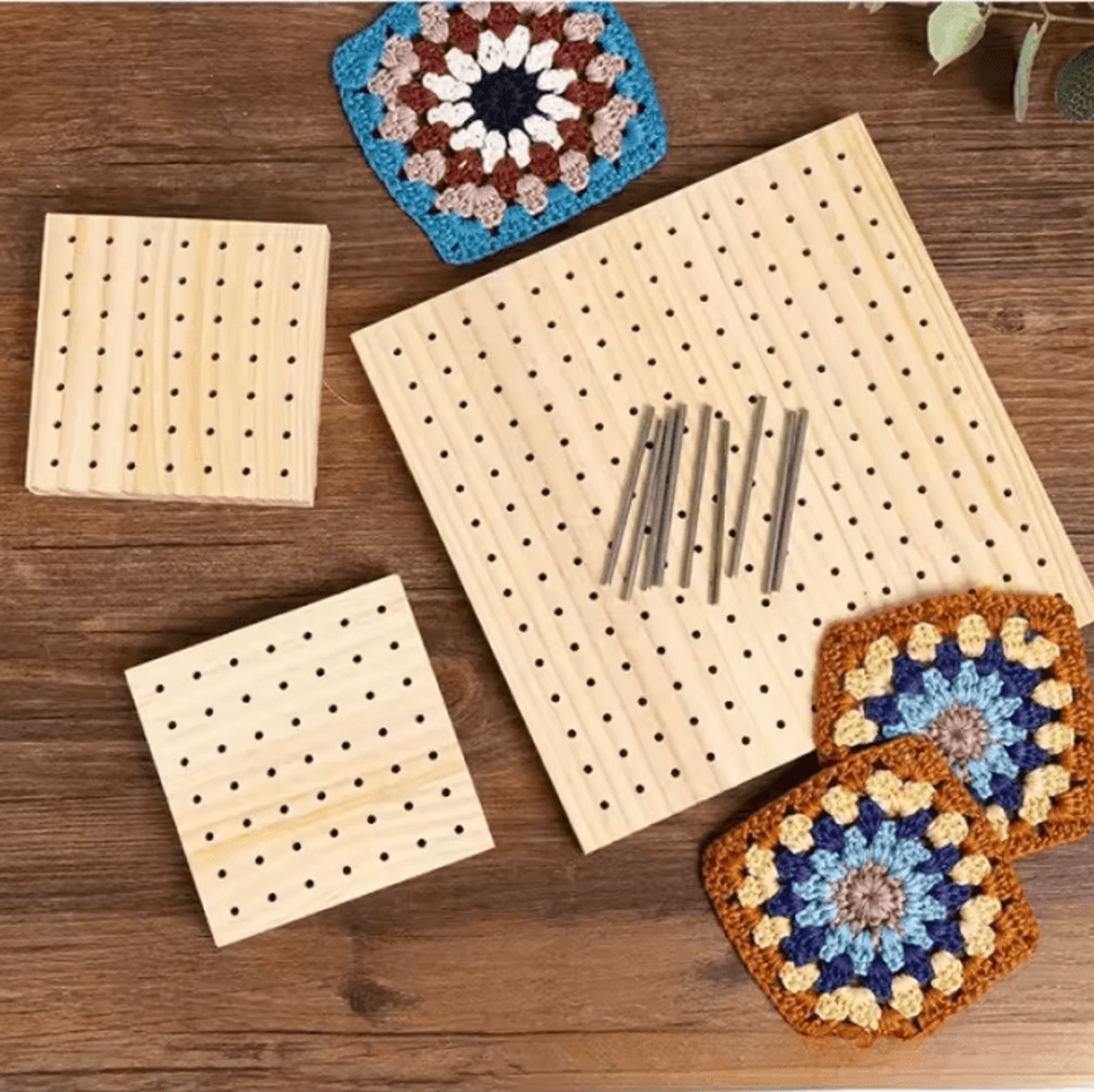 wooden crochet blocking board with stainless steel pins and grid