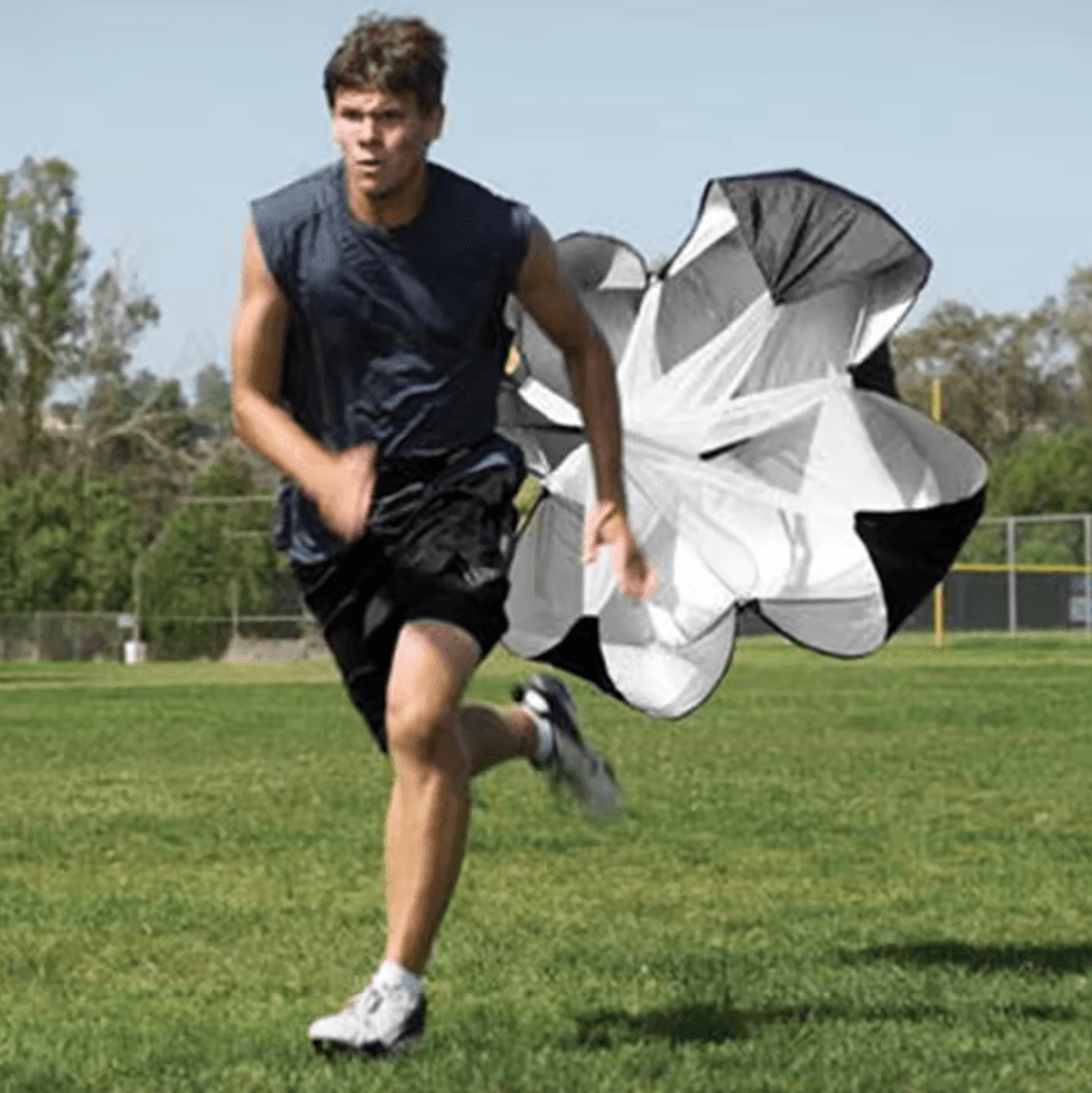 kids running resistance parachute for speed and agility training