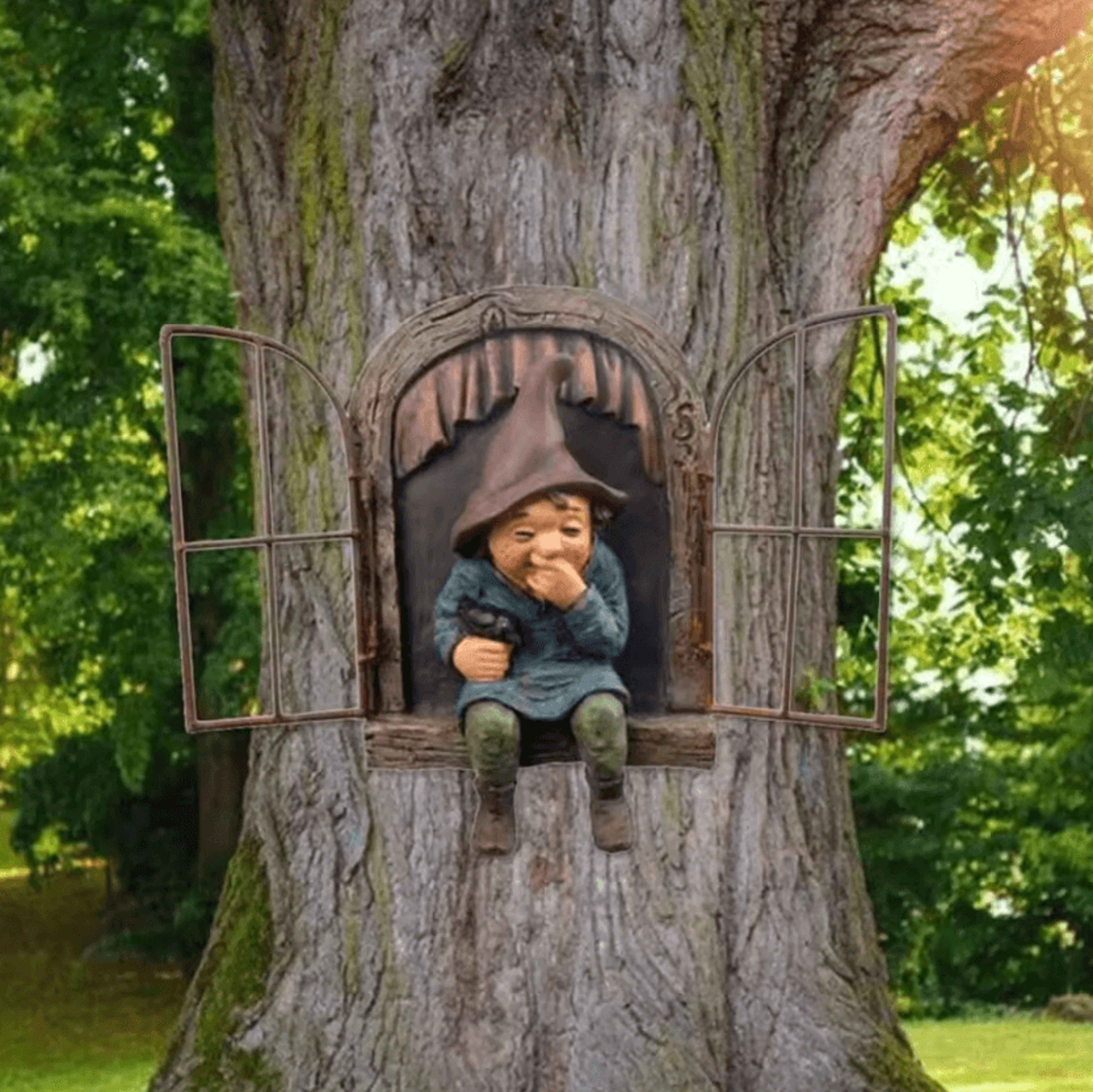 treepeek whimsical elf hugging garden statue
